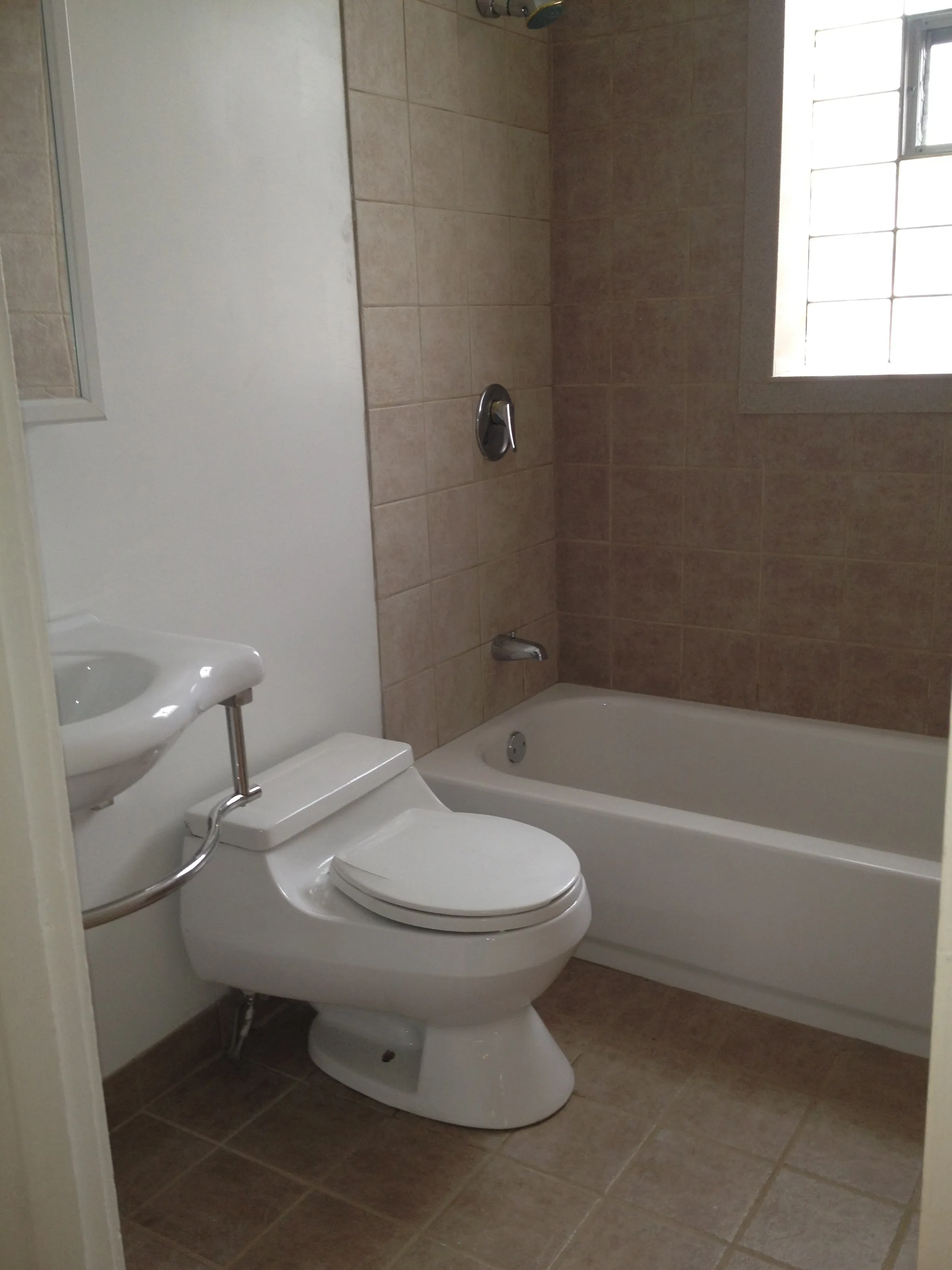 new bathroom with large linen or regular closet 