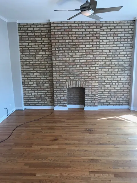 light brown brick exterior of 2401 N Clybourn Apartments