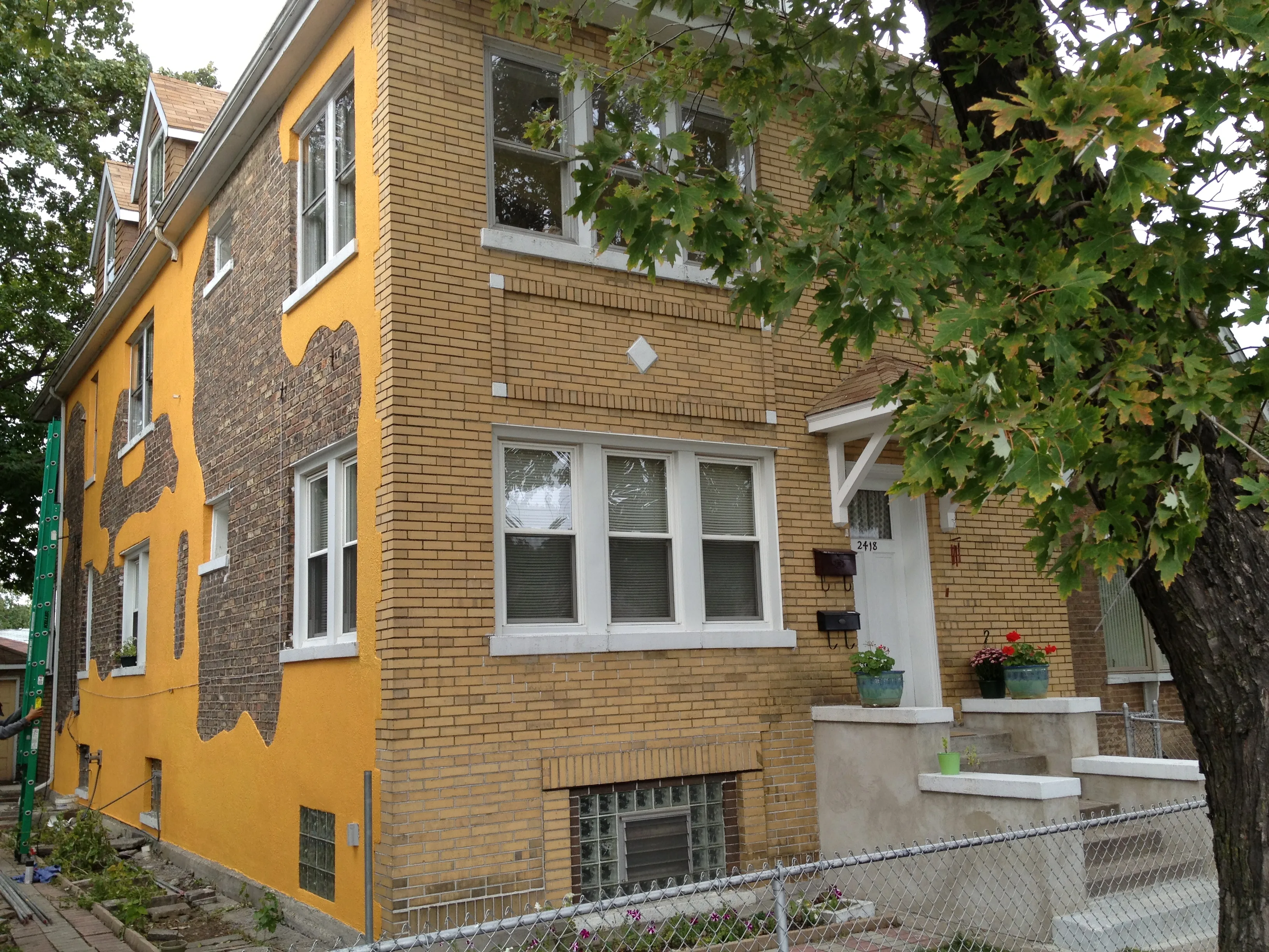 Wall facing yard/patio done in bistro design.