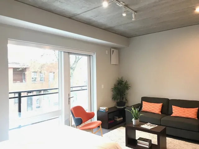 furnished luxury kitchen and living room at The Westerner Apartments