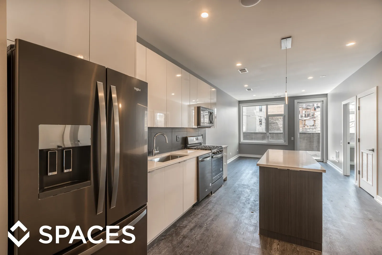 model apartment kitechen with wood floors at Clarkview Apartments