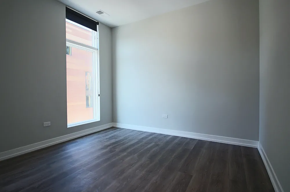 model living room at 713 North Milwaukee Apartments in Chicago