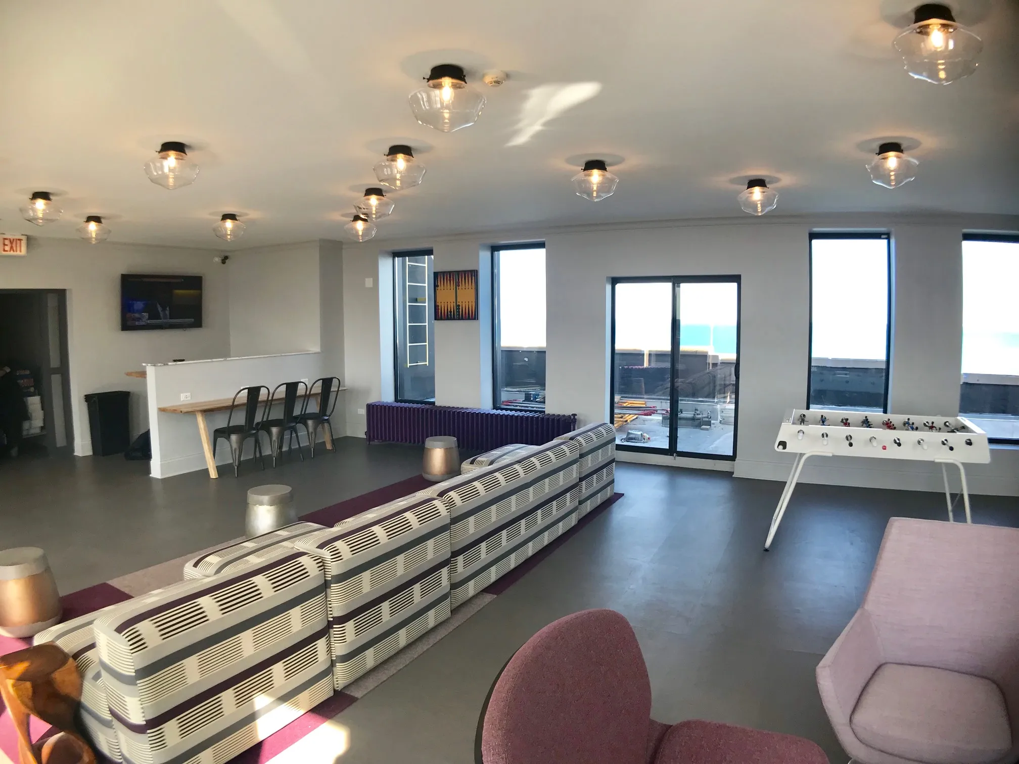 one bedroom living room with wood flooring at 1033 West Loyola Apartments