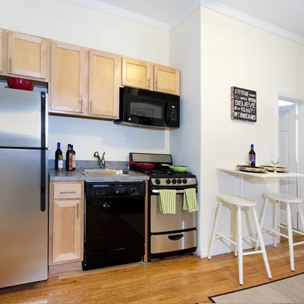 corner view of Reside 2525 Apartments with Starbucks on 1st floor