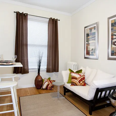 corner view of Reside 2525 Apartments with Starbucks on 1st floor