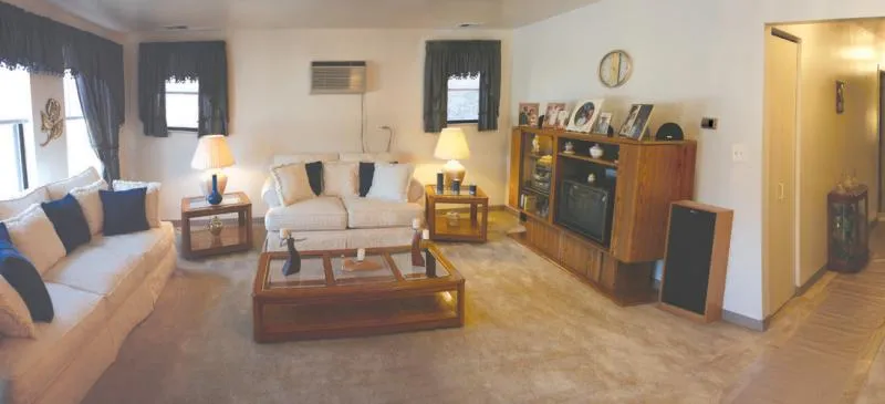living room at Wllard Square Apartments in Brozeville Chicago