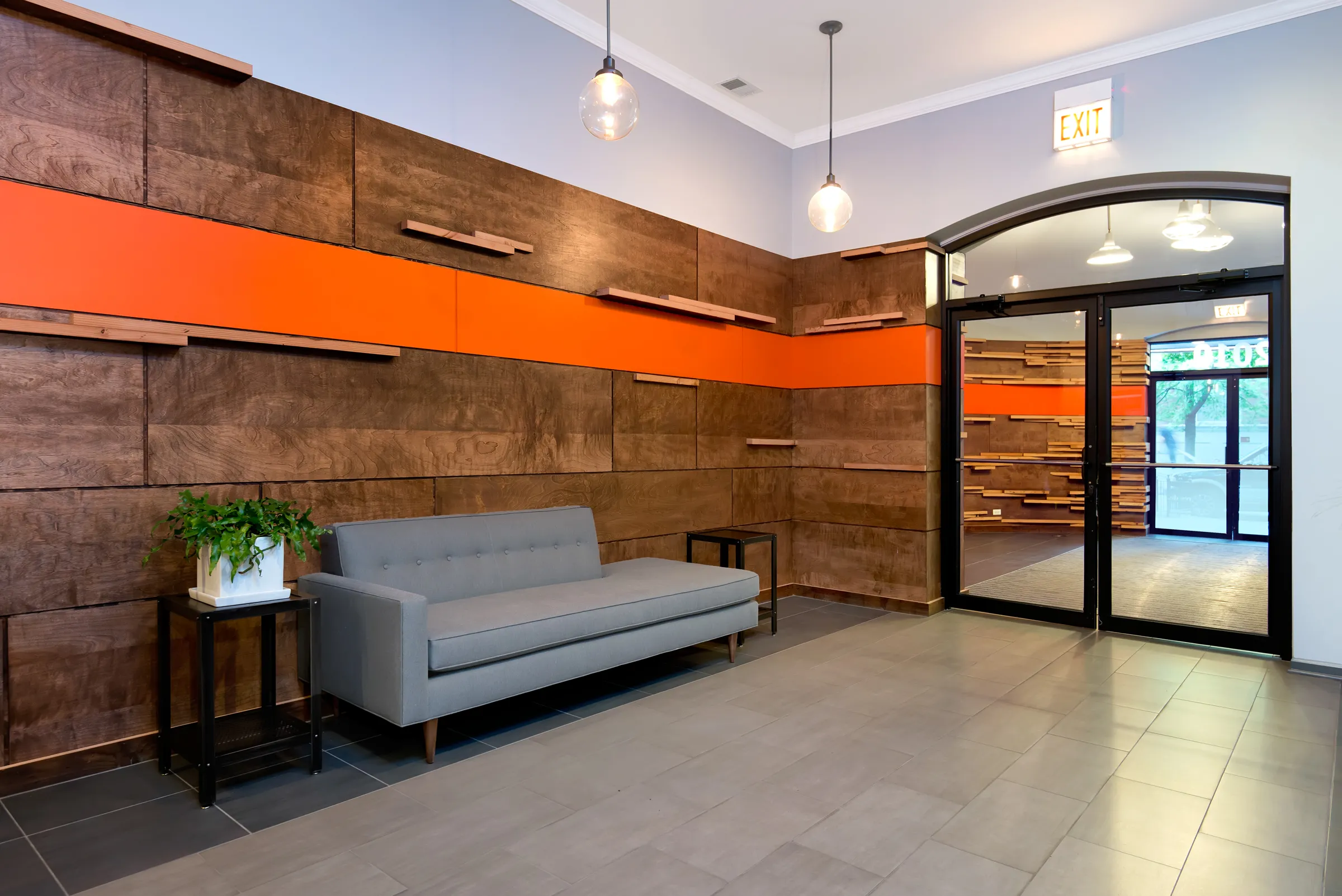 outside red brick of 2010 West Pierce Apartments in Wicker Park Chicago