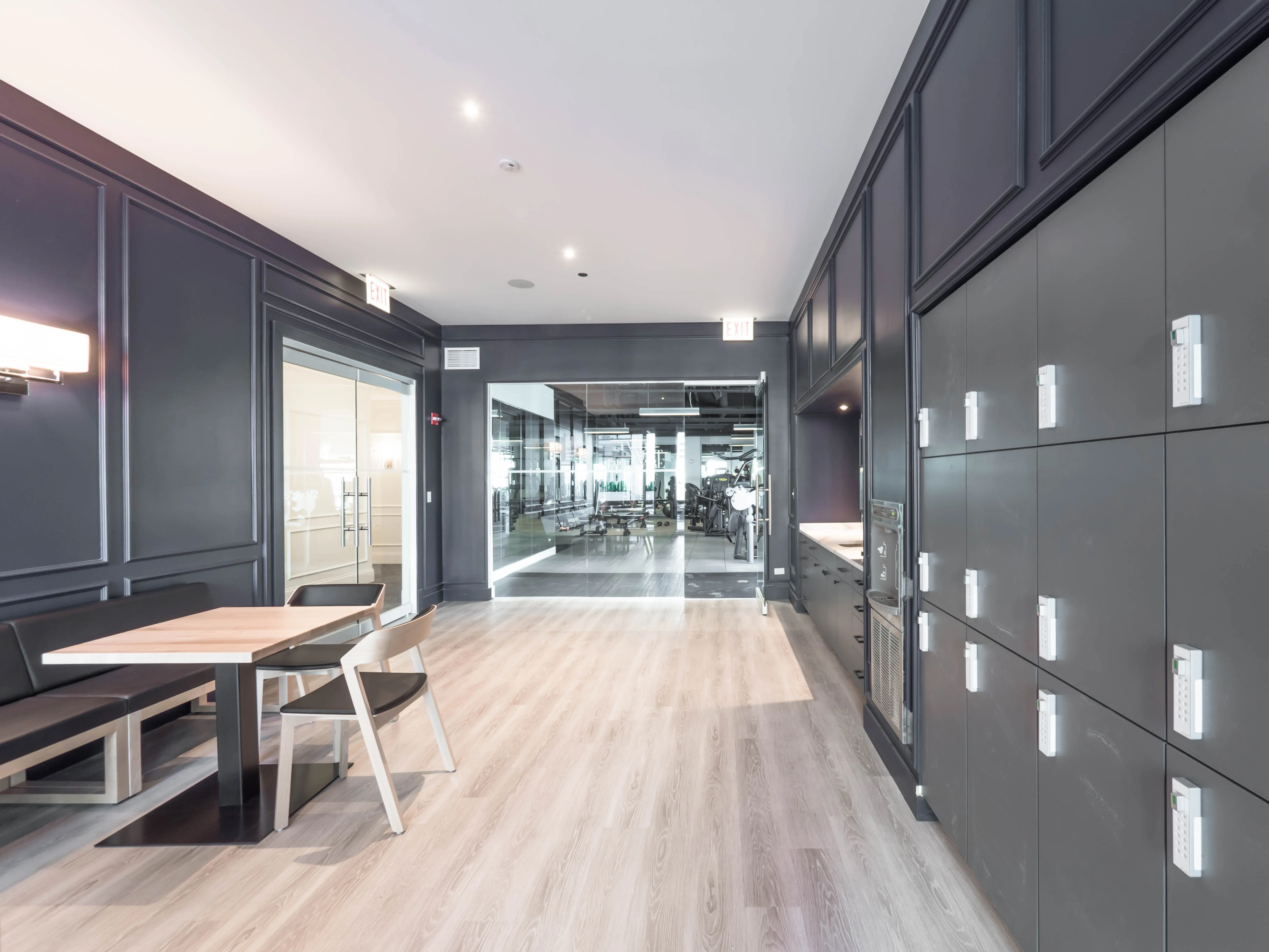 model corner furnished living room at Two West Delaware Apartments