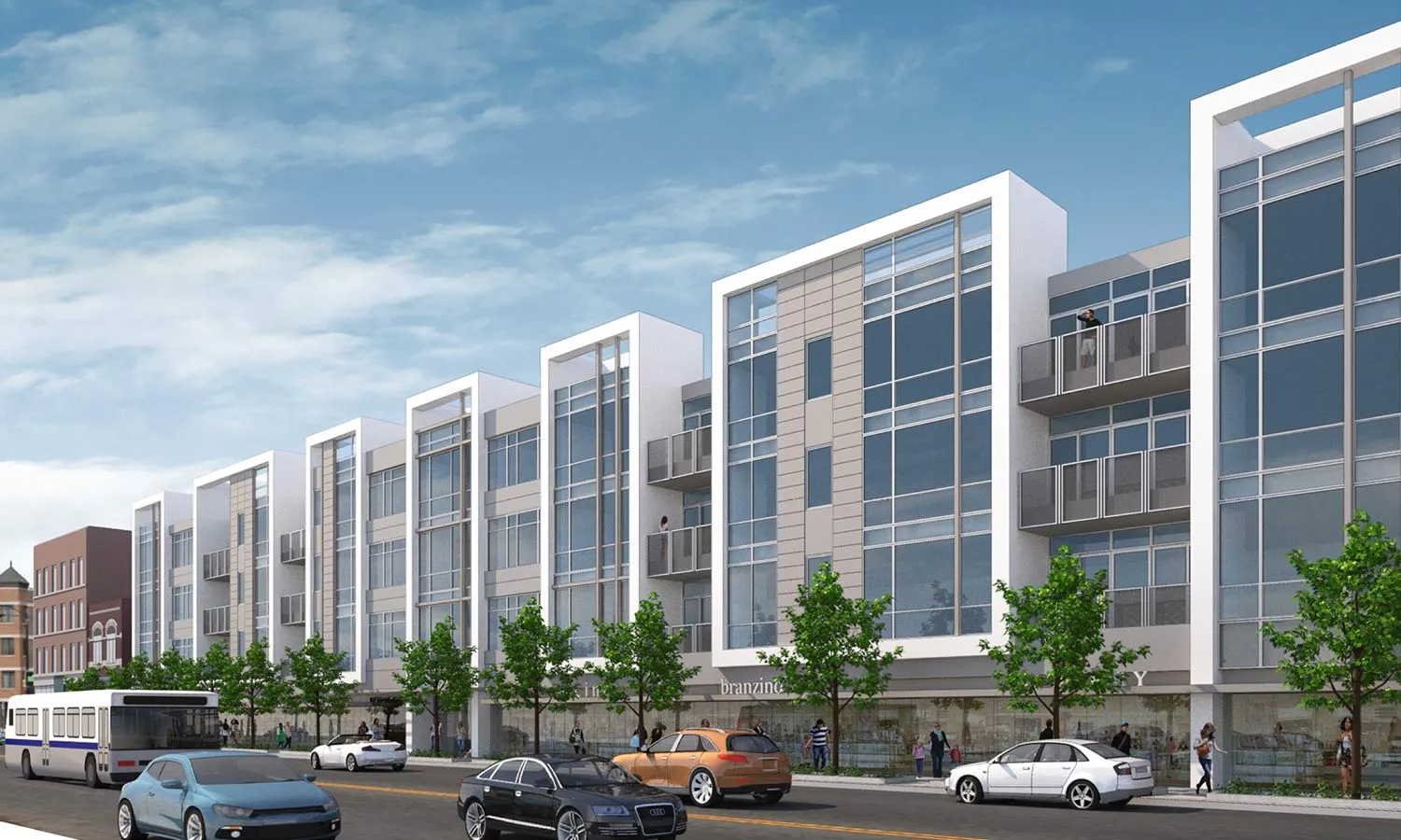 kitchen island with stool and couch at Luxe On Chicago Apartments