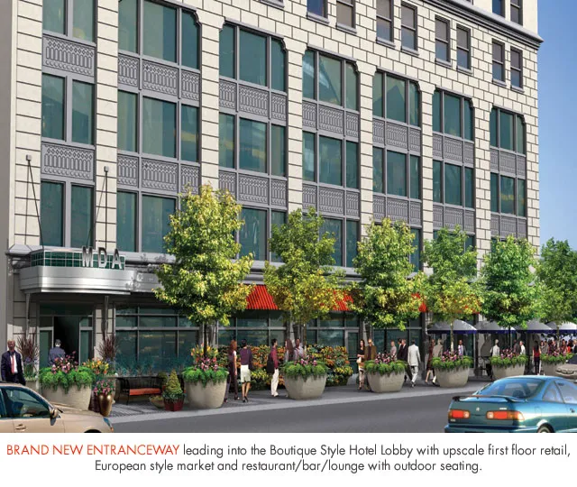 entrance to MDA City Club Apartments with red bench a flowers in pot