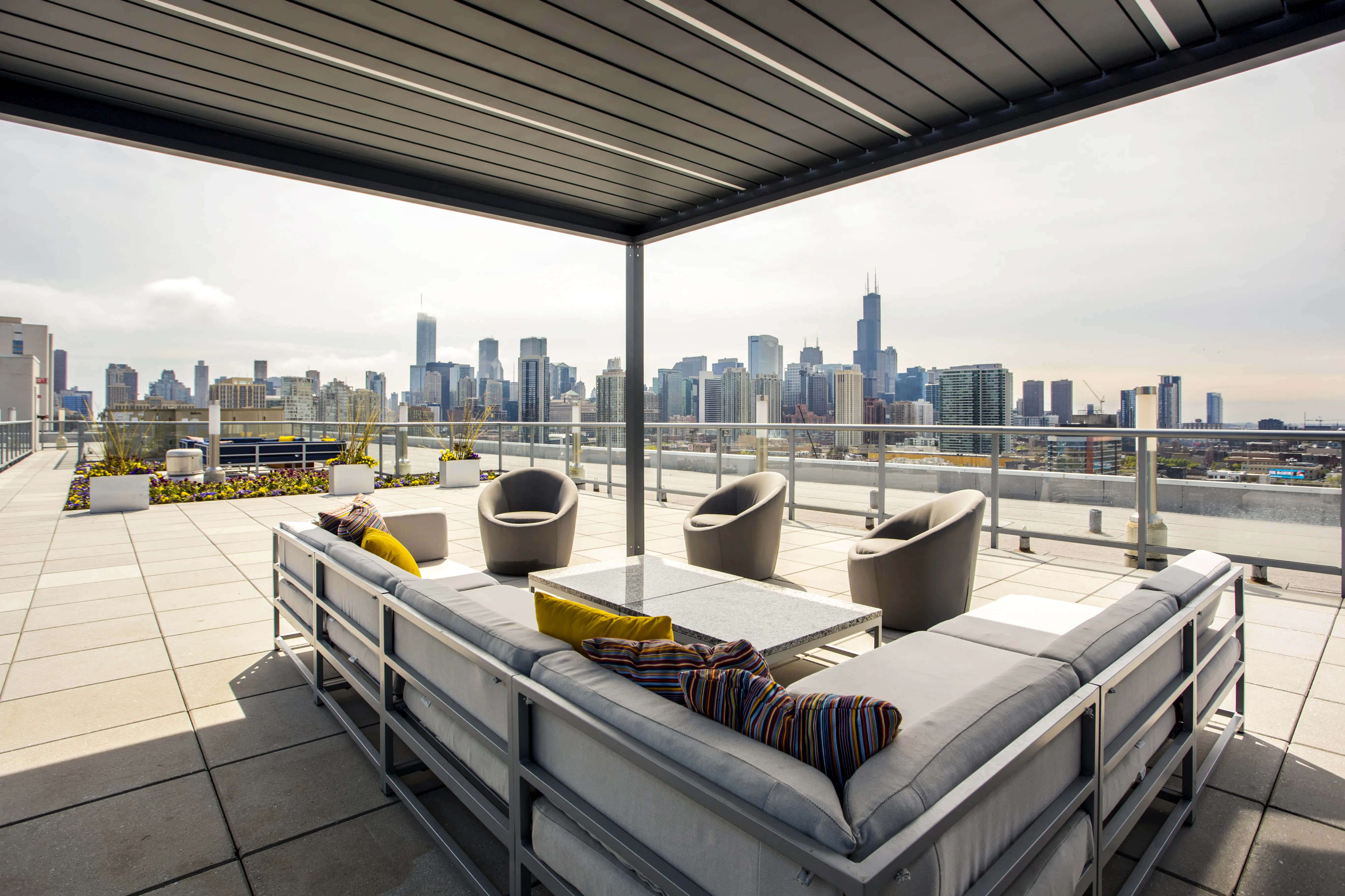 living room and view of chicago at Mondial River West Apartments