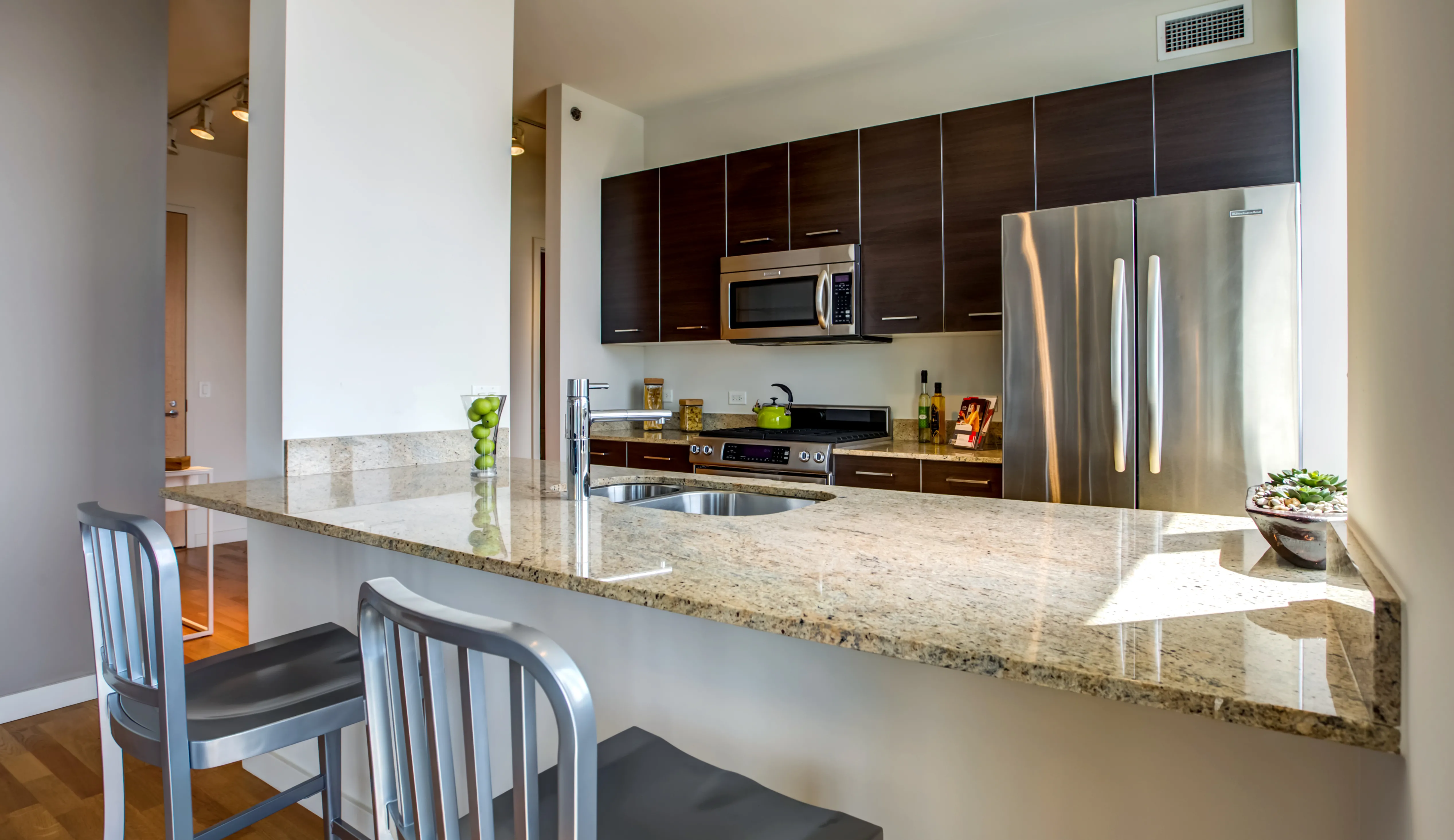 living room and view of chicago at Mondial River West Apartments