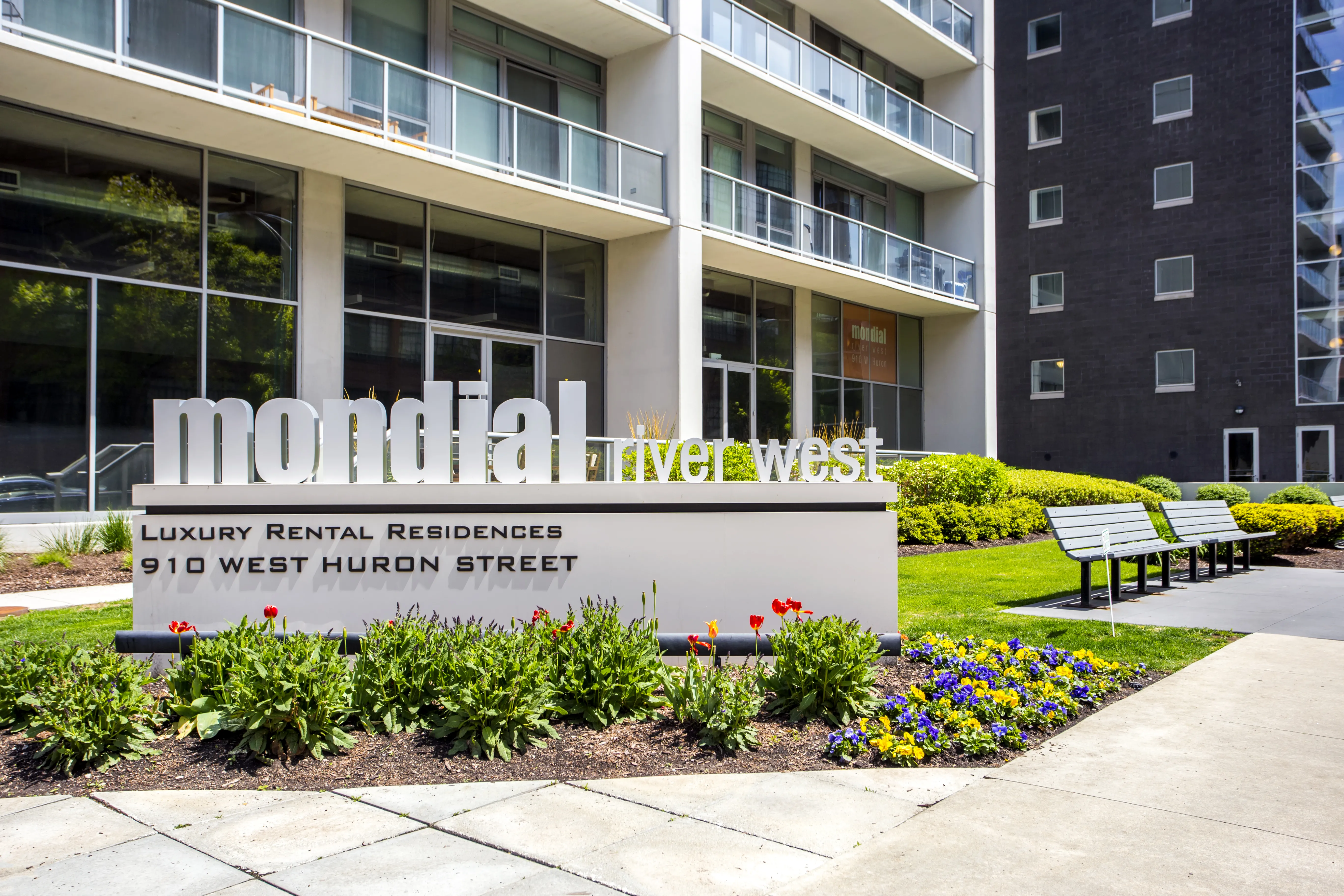 living room and view of chicago at Mondial River West Apartments
