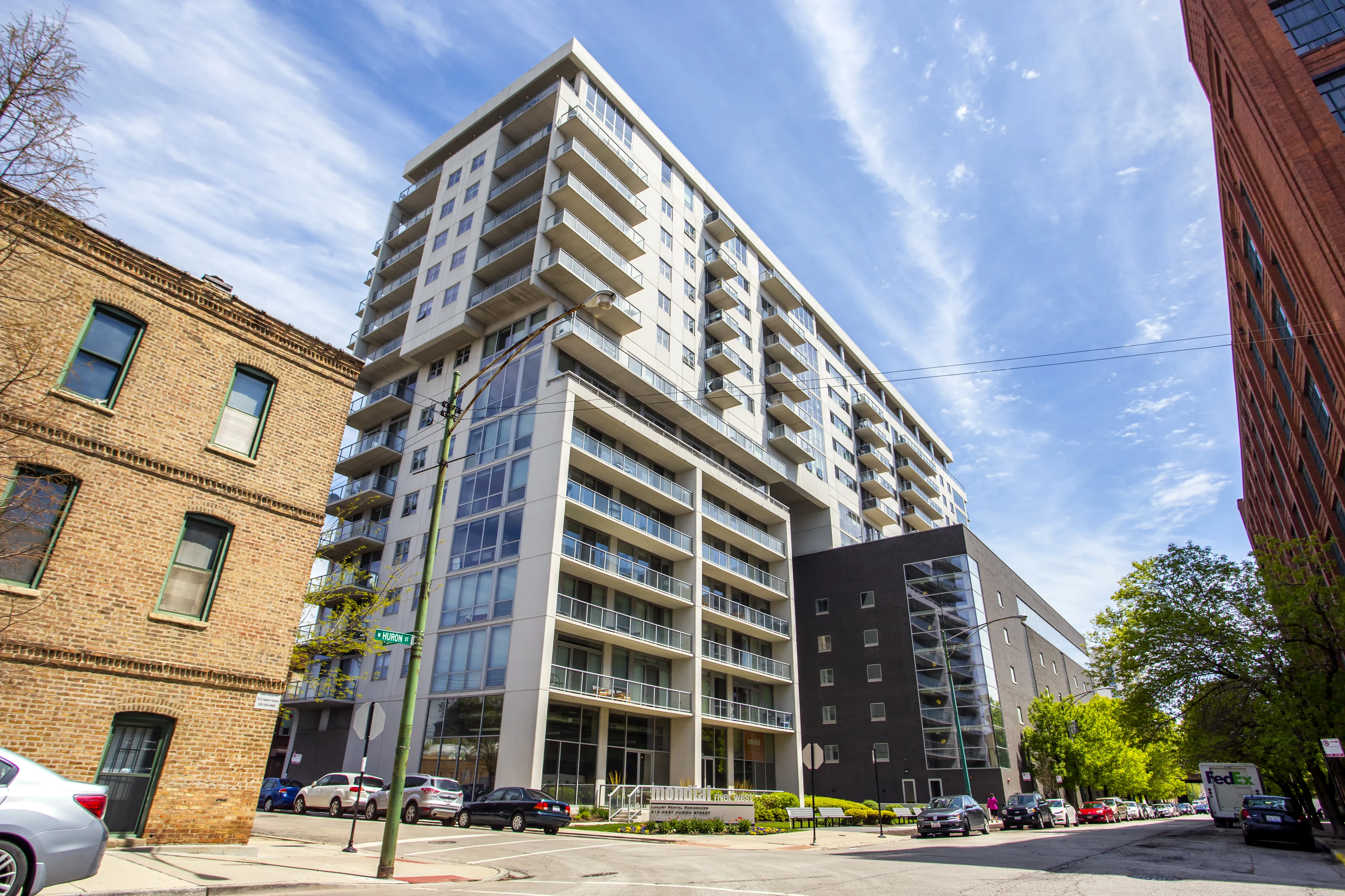 living room and view of chicago at Mondial River West Apartments
