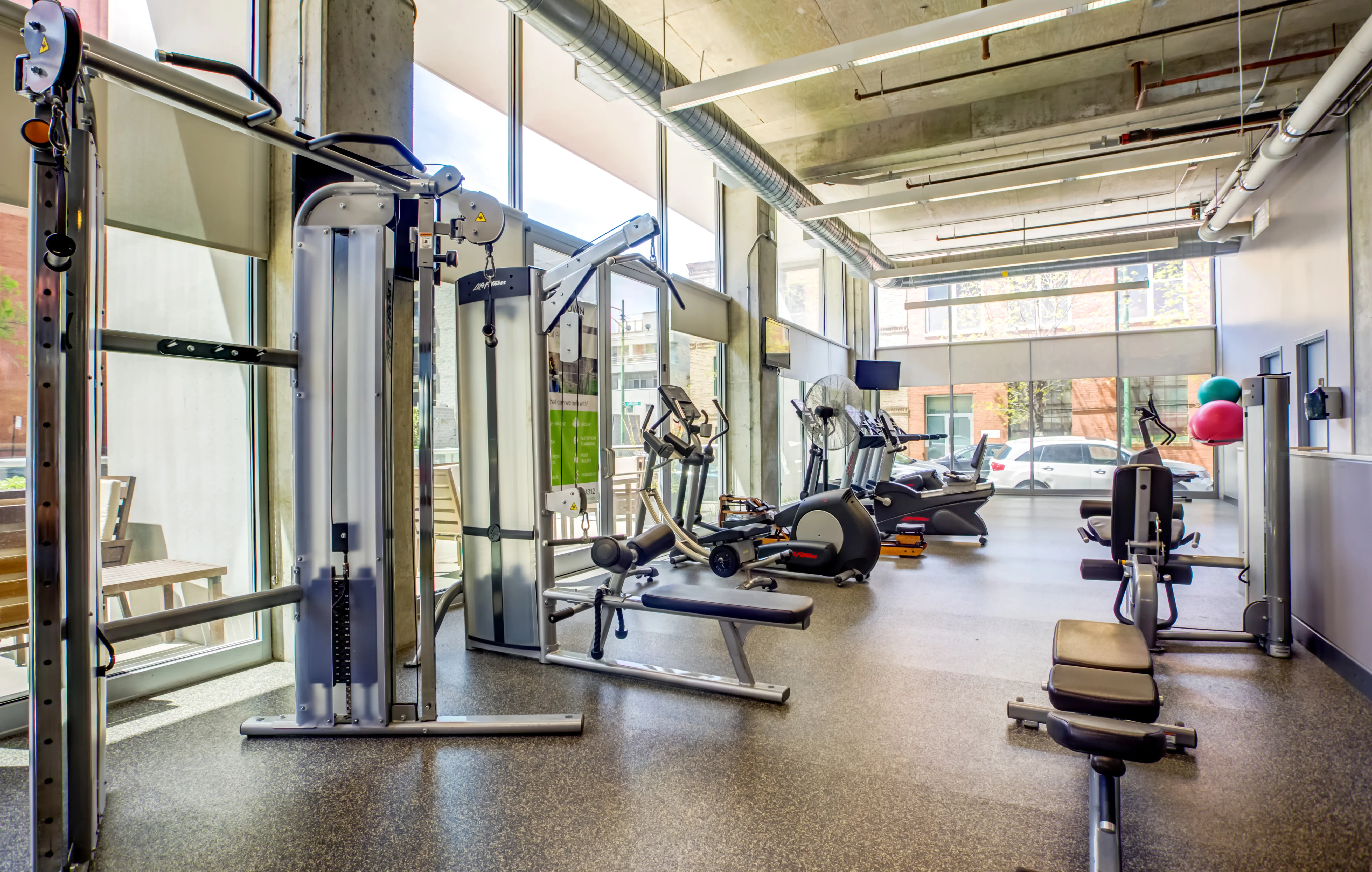 living room and view of chicago at Mondial River West Apartments