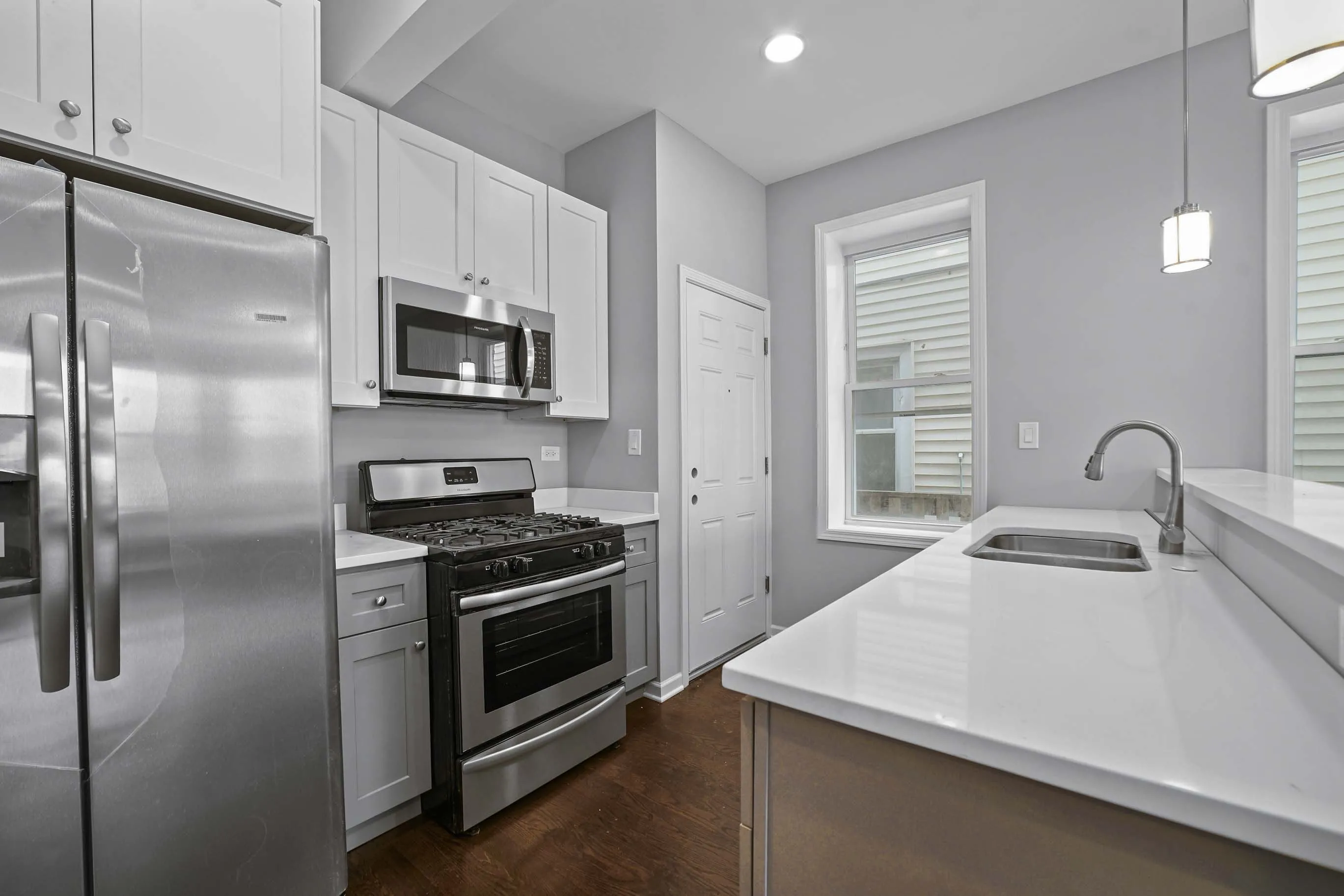 2 Bedroom unit kitchen model at 1603 South Wood Apartments