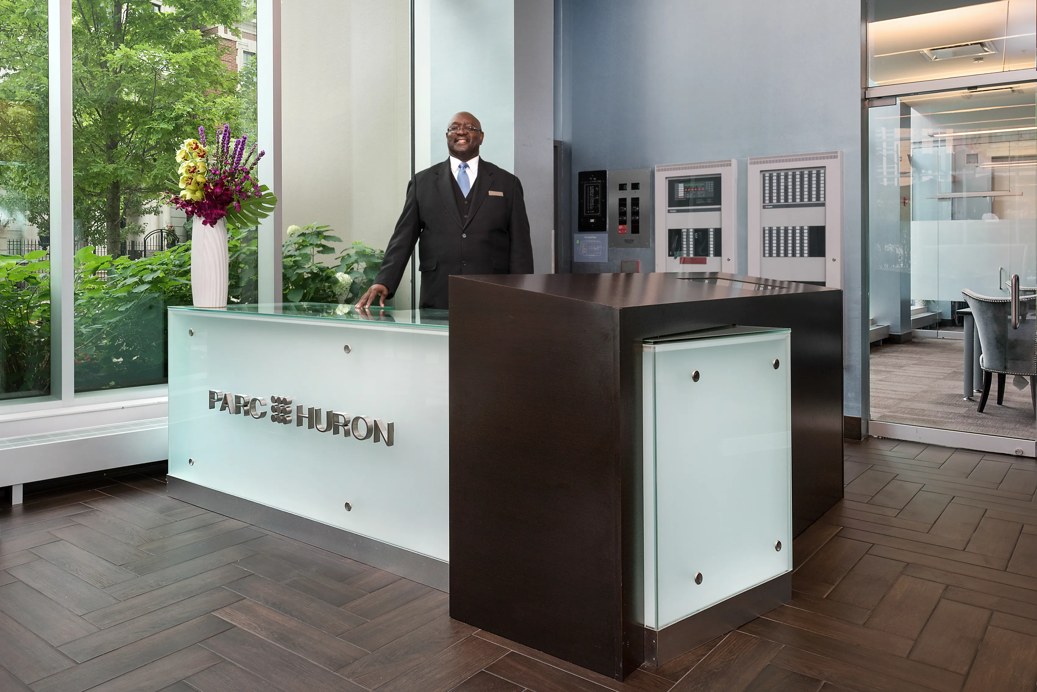 living room and kitchen island at Parc Huron Apartments in Chicago