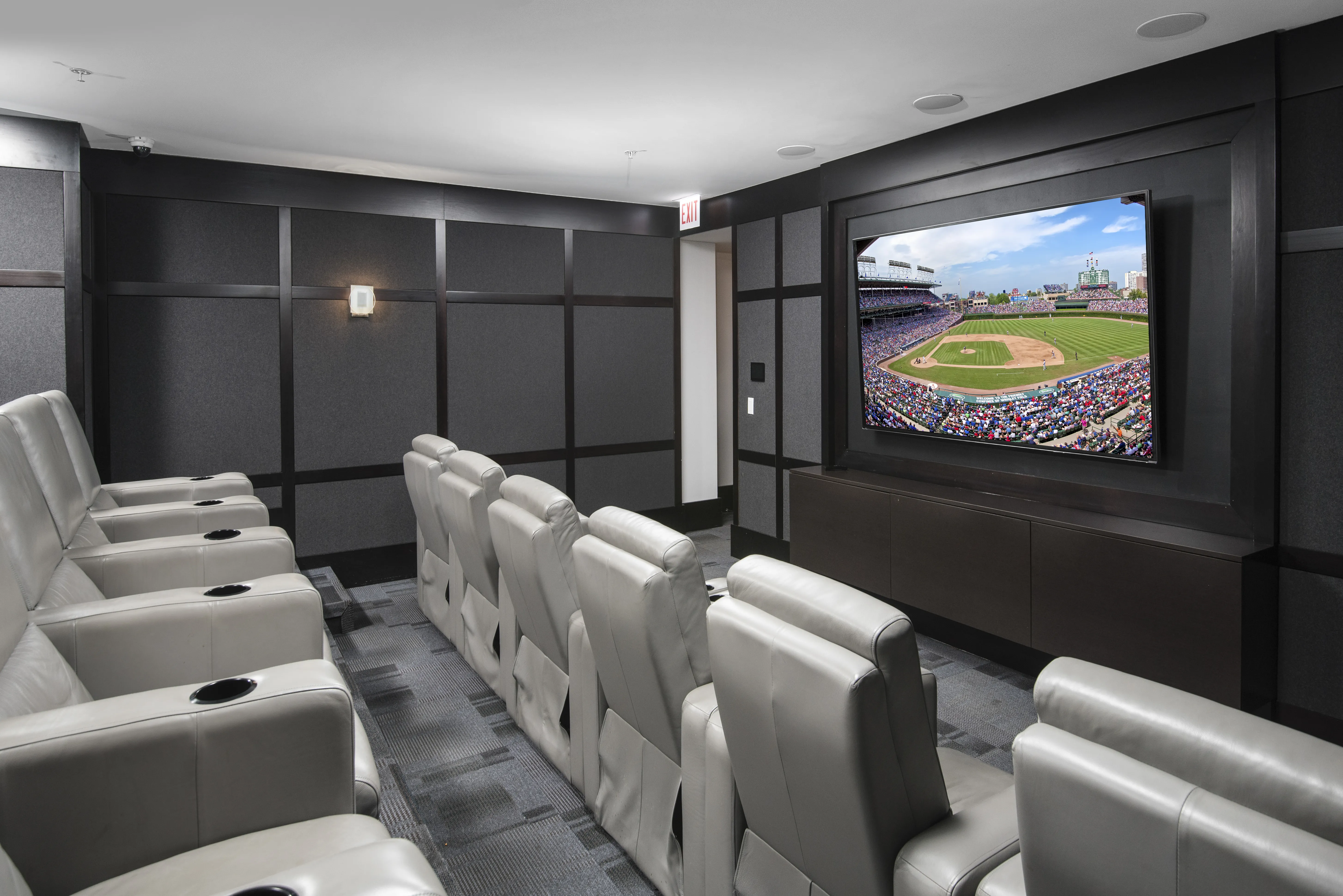 Elegant hardwood flooring, designer pendant lighting and custom cabinetry stand o