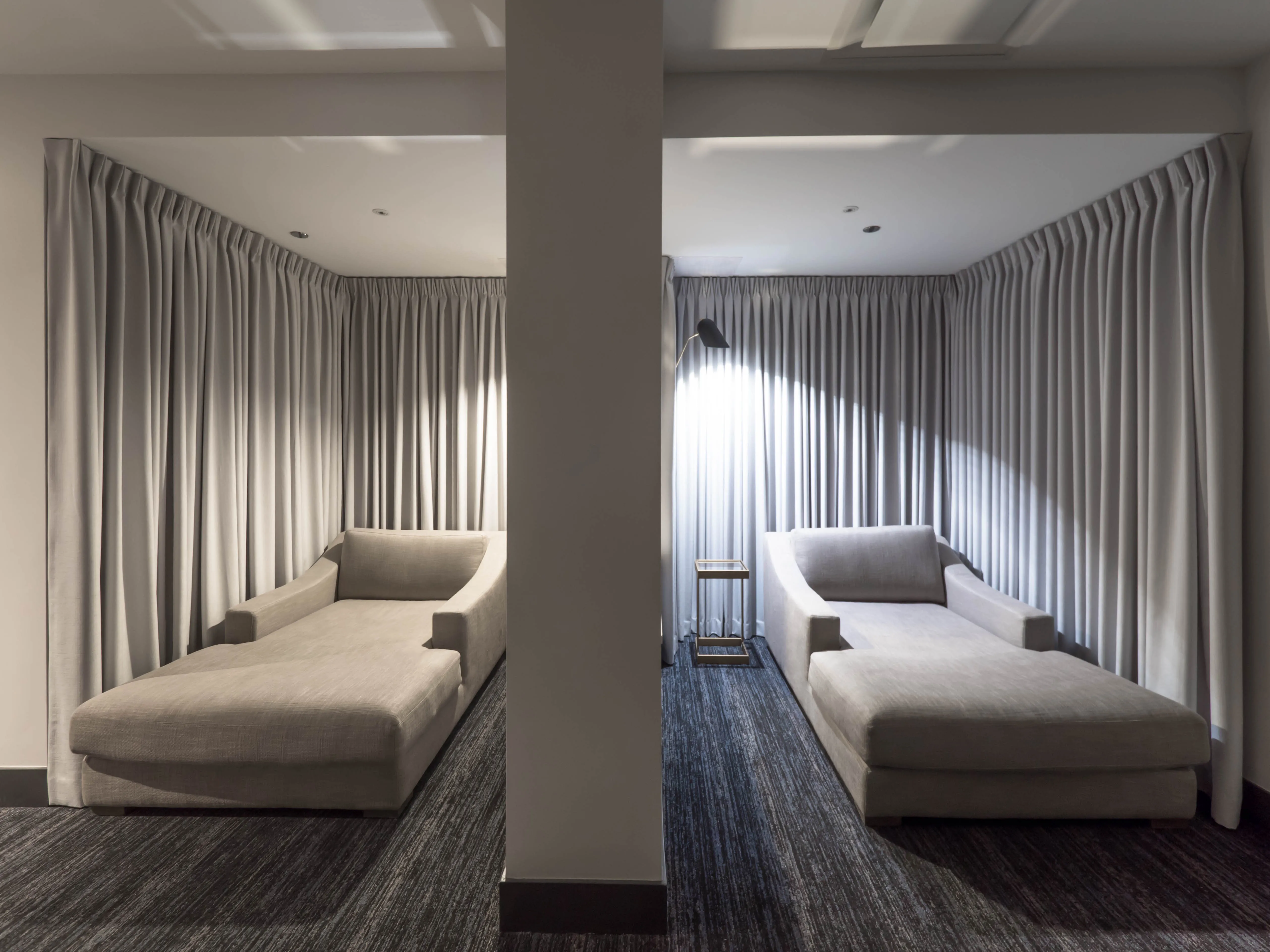 model corner furnished living room at Two West Delaware Apartments