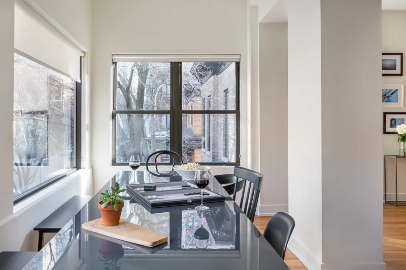 dining room with table at Common Briar Apartments in Lakeview Chicago