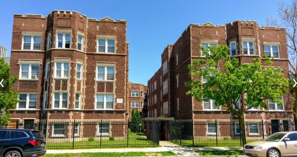 brick courtyard apartment building at 7517 S. Coles Ave in Chicago, IL
