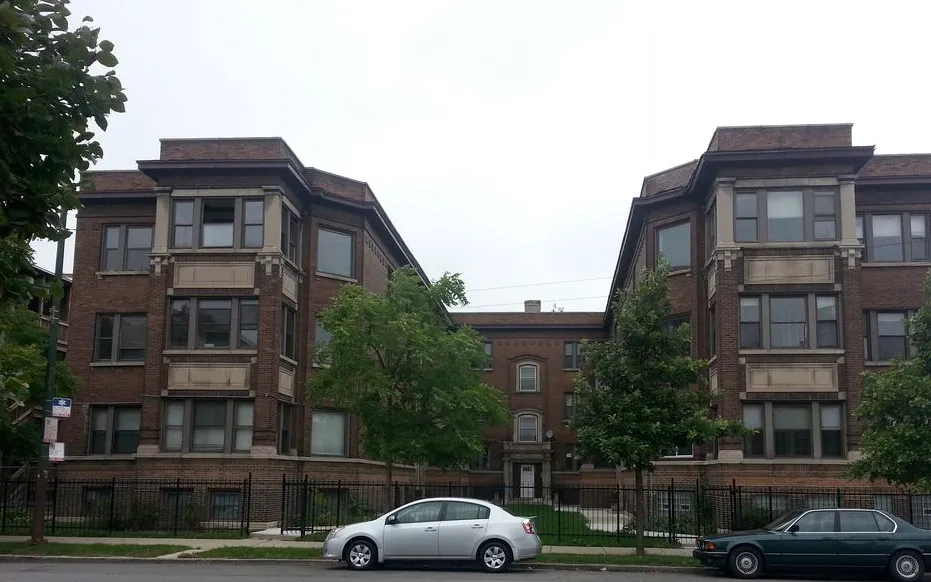 vintage courtyard apartment building in East Garfield Park neighborhood Chicago