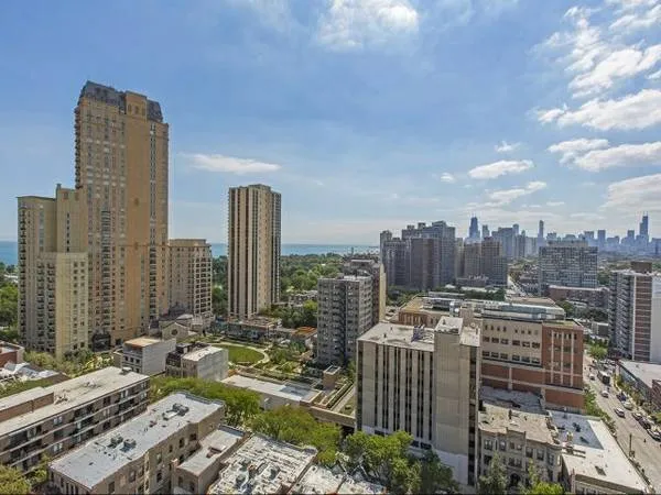 master bedroom with view at 2555 N. Clark Apartments in Lincoln Park