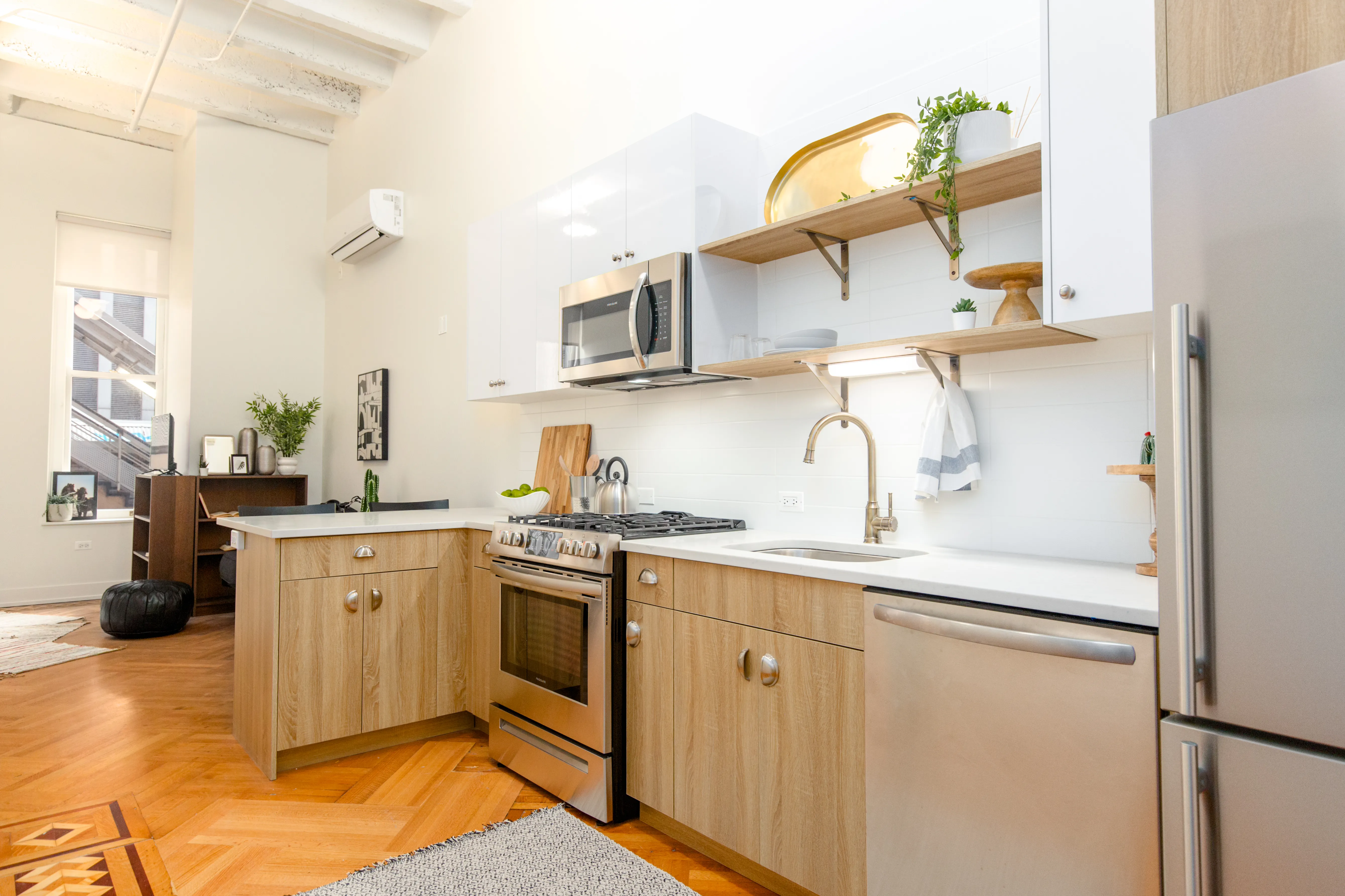 kitchen with white counters in The Alfred for Rent in The Chicago Loop