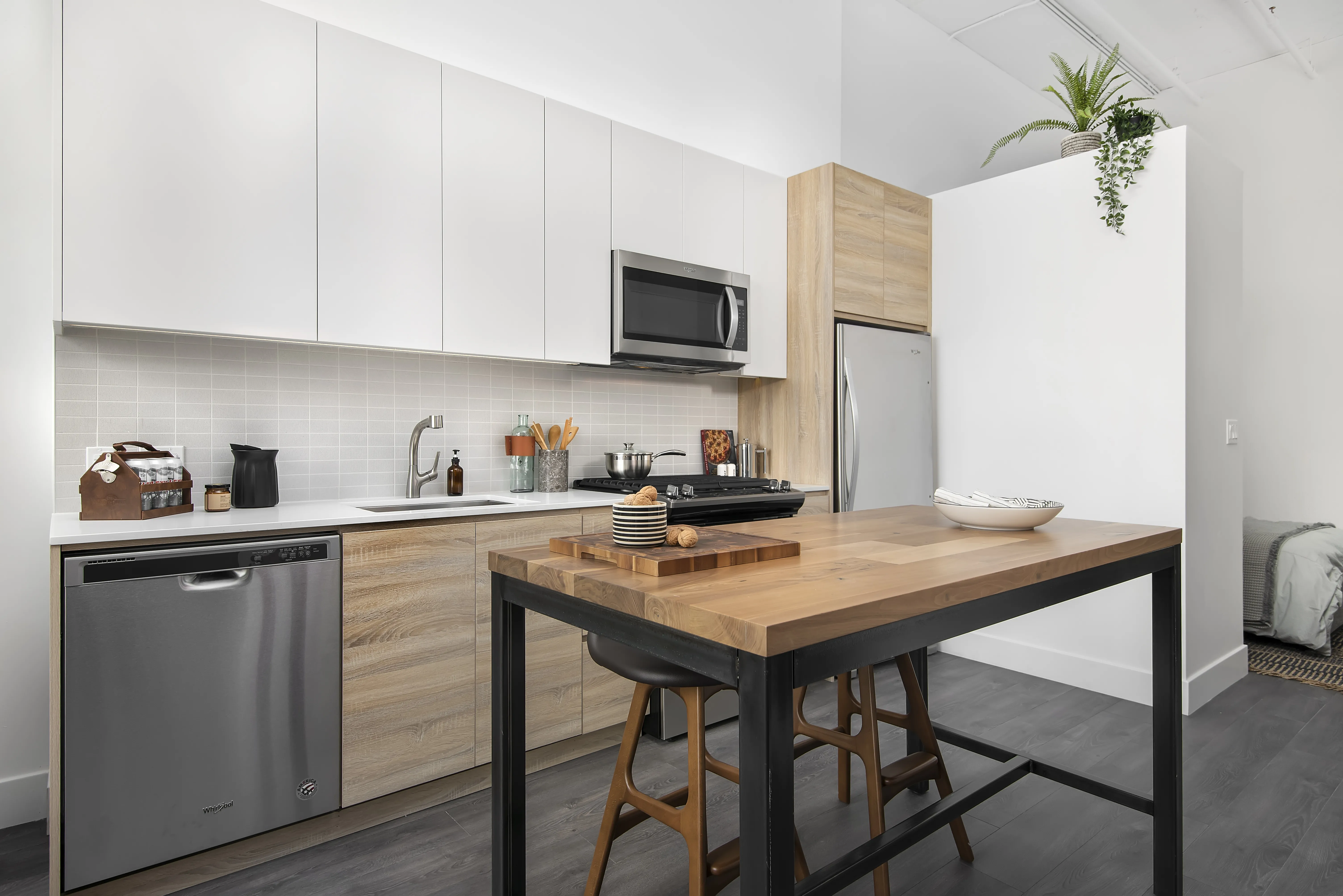 model kitchen, living room and view from Field's Loft Apartments in Chicago