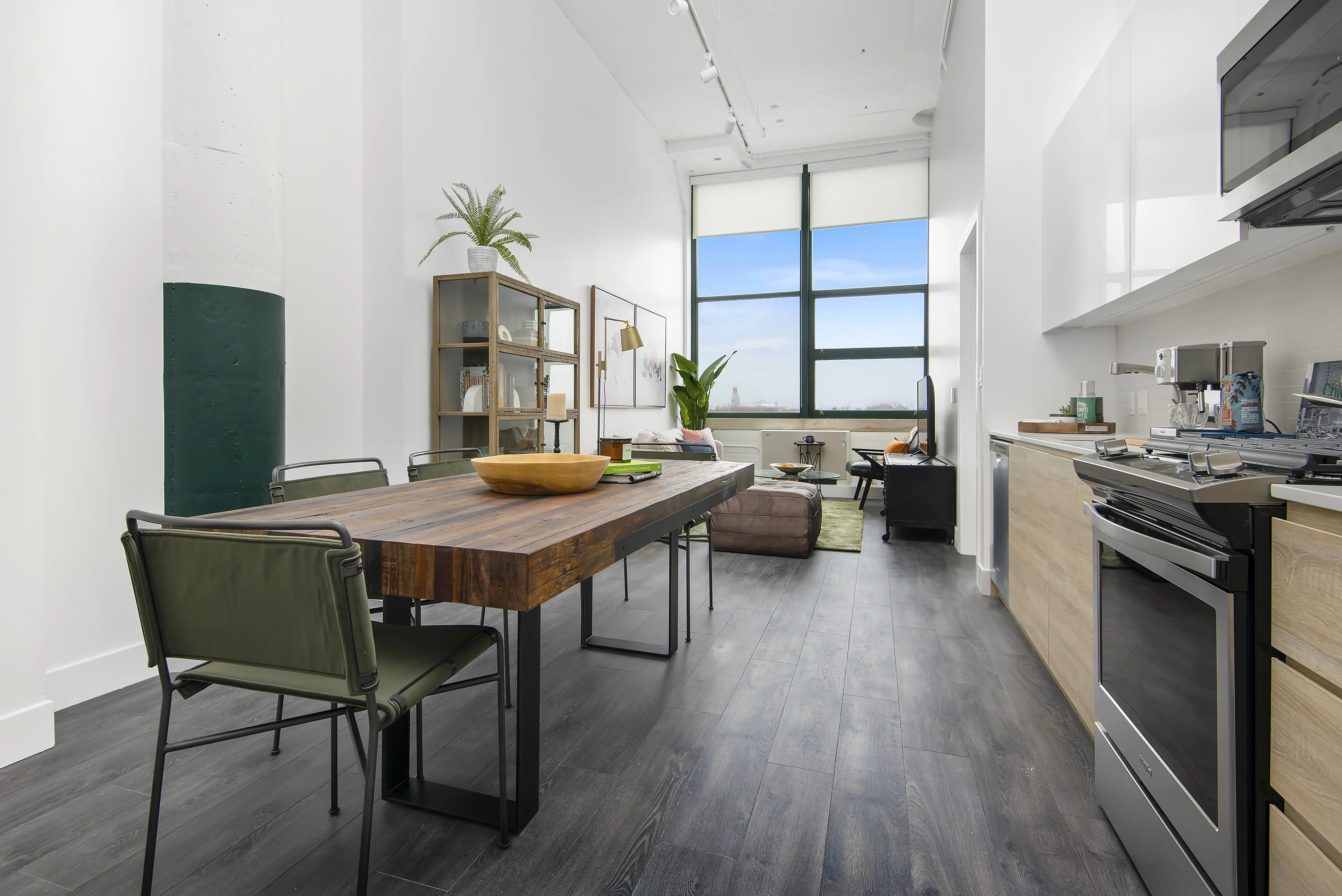 model kitchen, living room and view from Field's Loft Apartments in Chicago