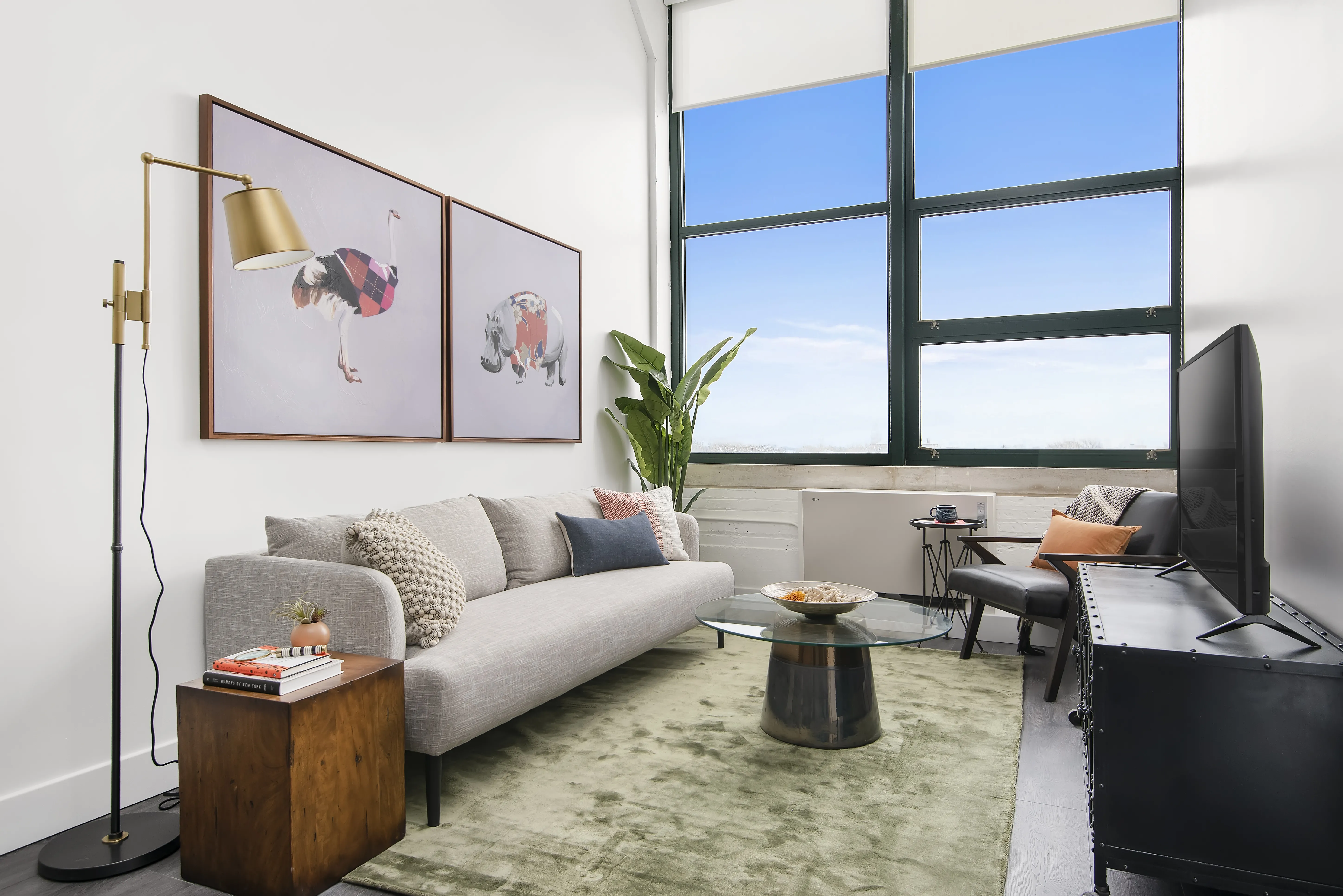 model kitchen, living room and view from Field's Loft Apartments in Chicago