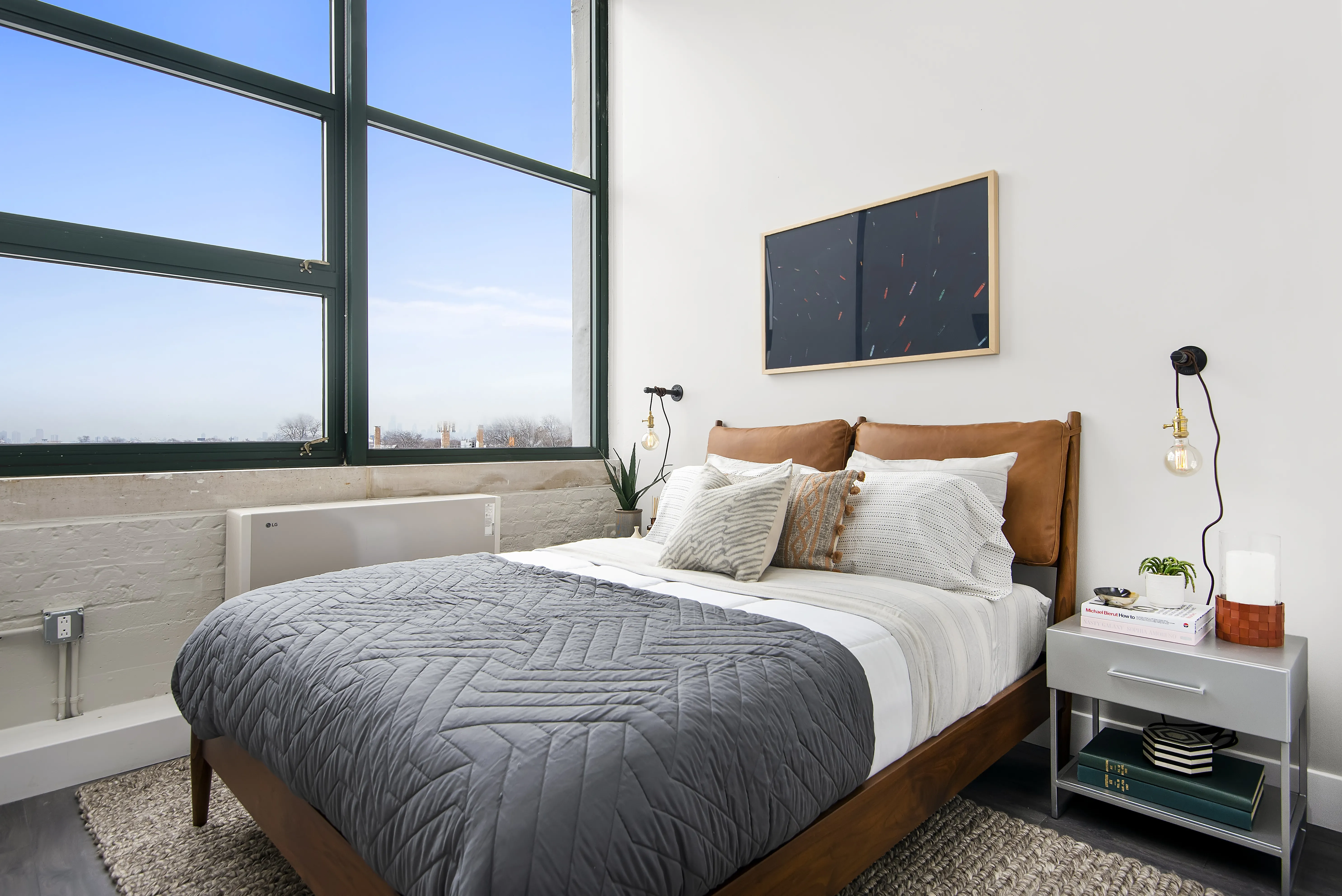 model kitchen, living room and view from Field's Loft Apartments in Chicago
