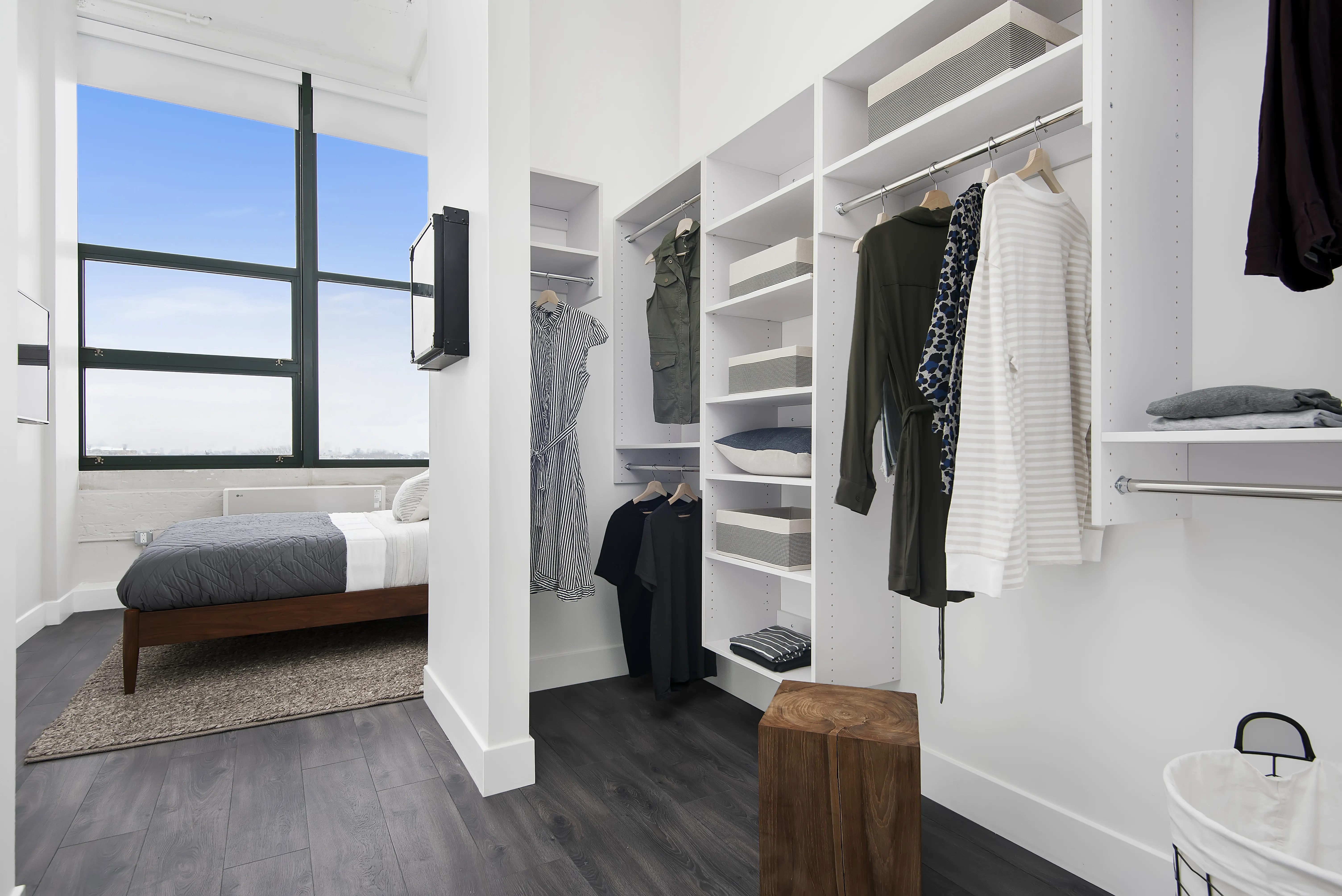 model kitchen, living room and view from Field's Loft Apartments in Chicago