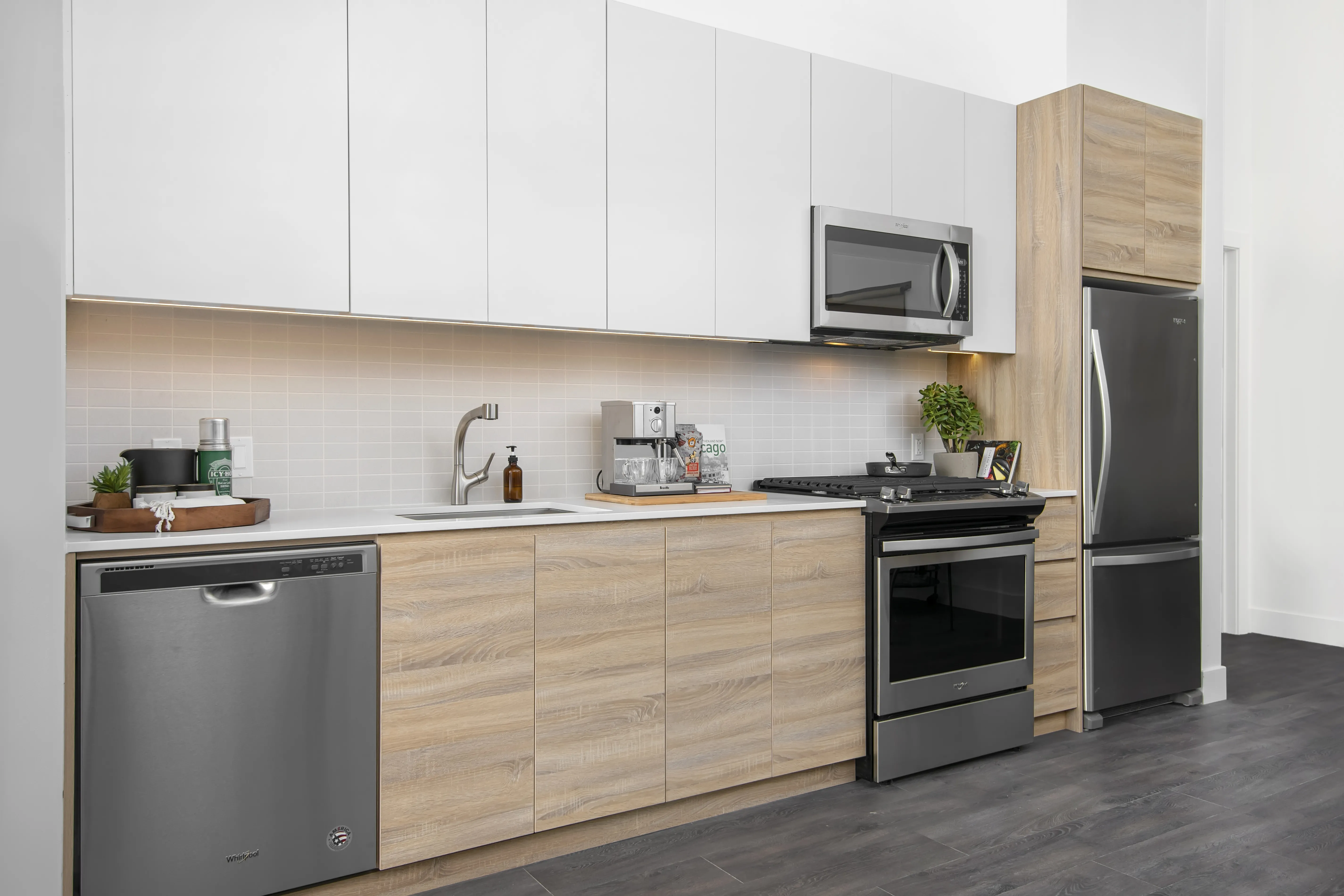 model kitchen, living room and view from Field's Loft Apartments in Chicago