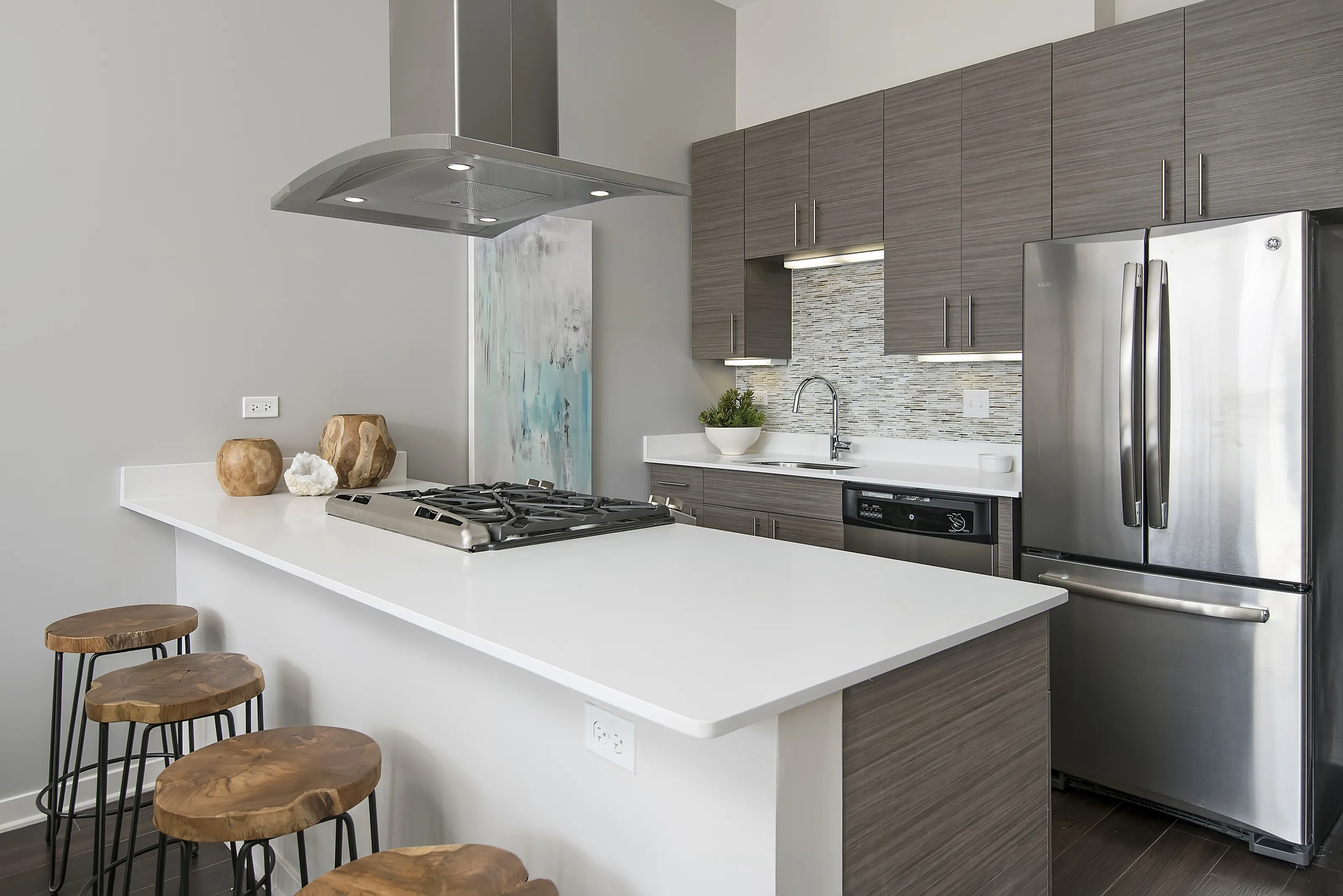 model living rooms with view at Luxe on Madison Apartments