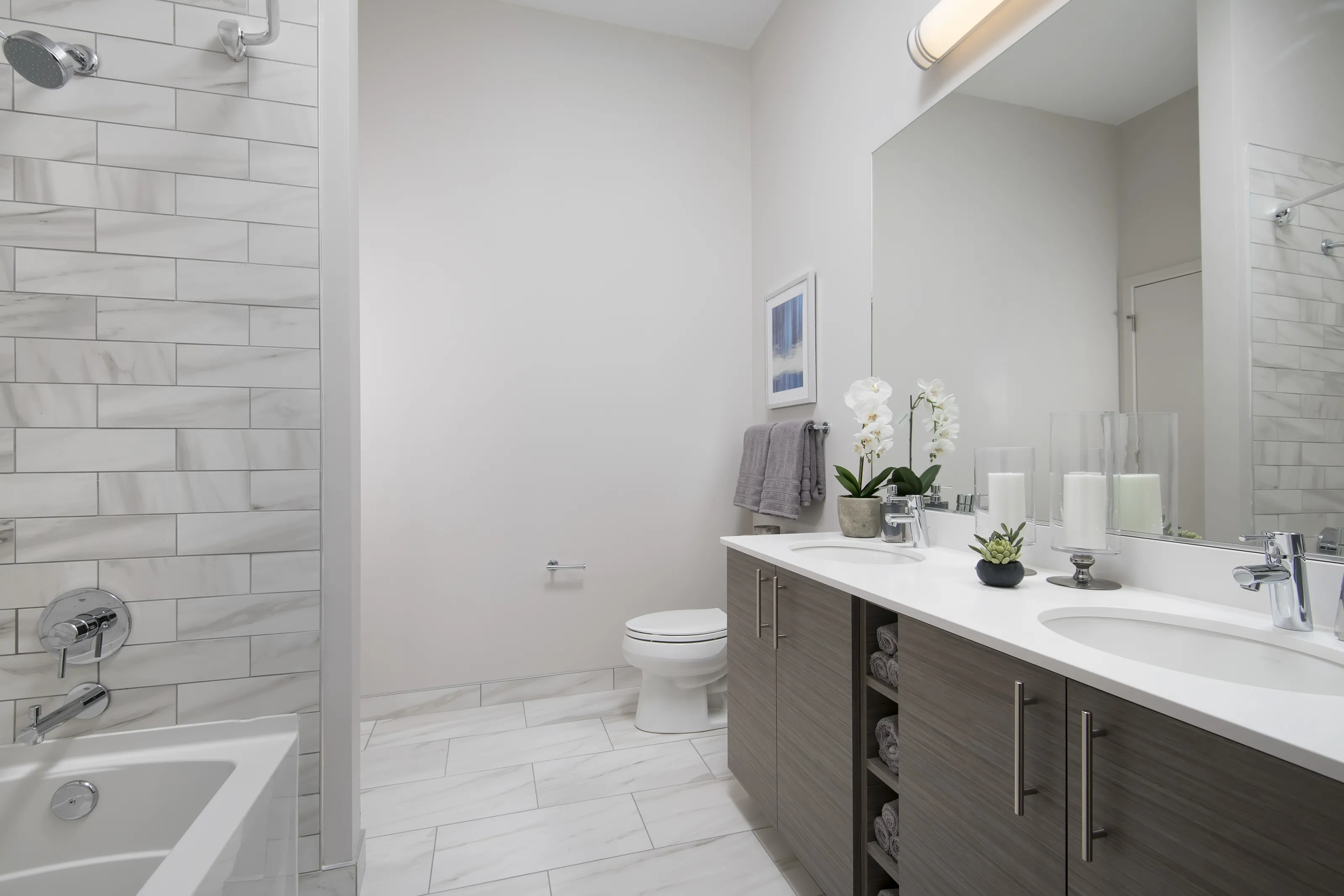 model living rooms with view at Luxe on Madison Apartments