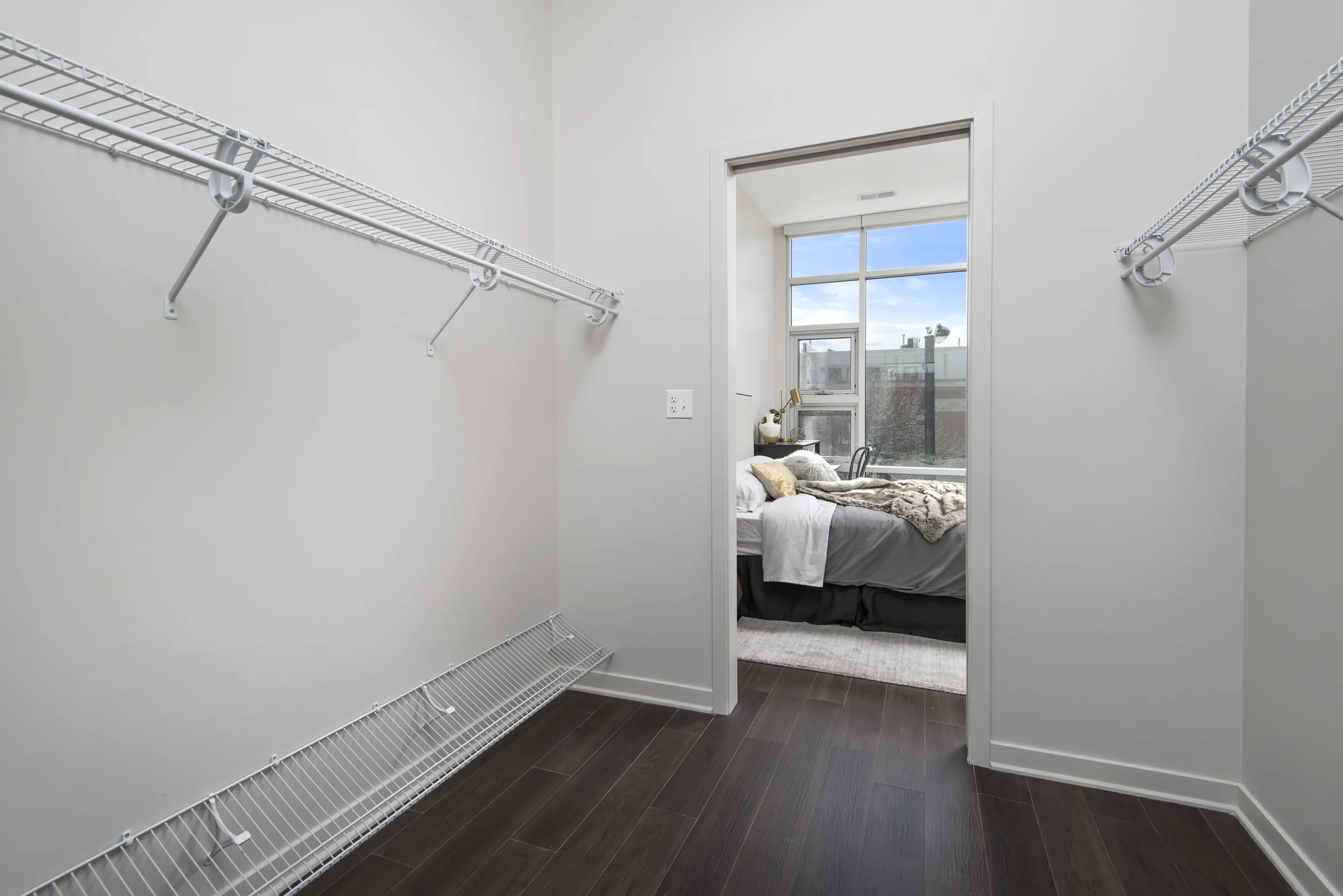 model living rooms with view at Luxe on Madison Apartments