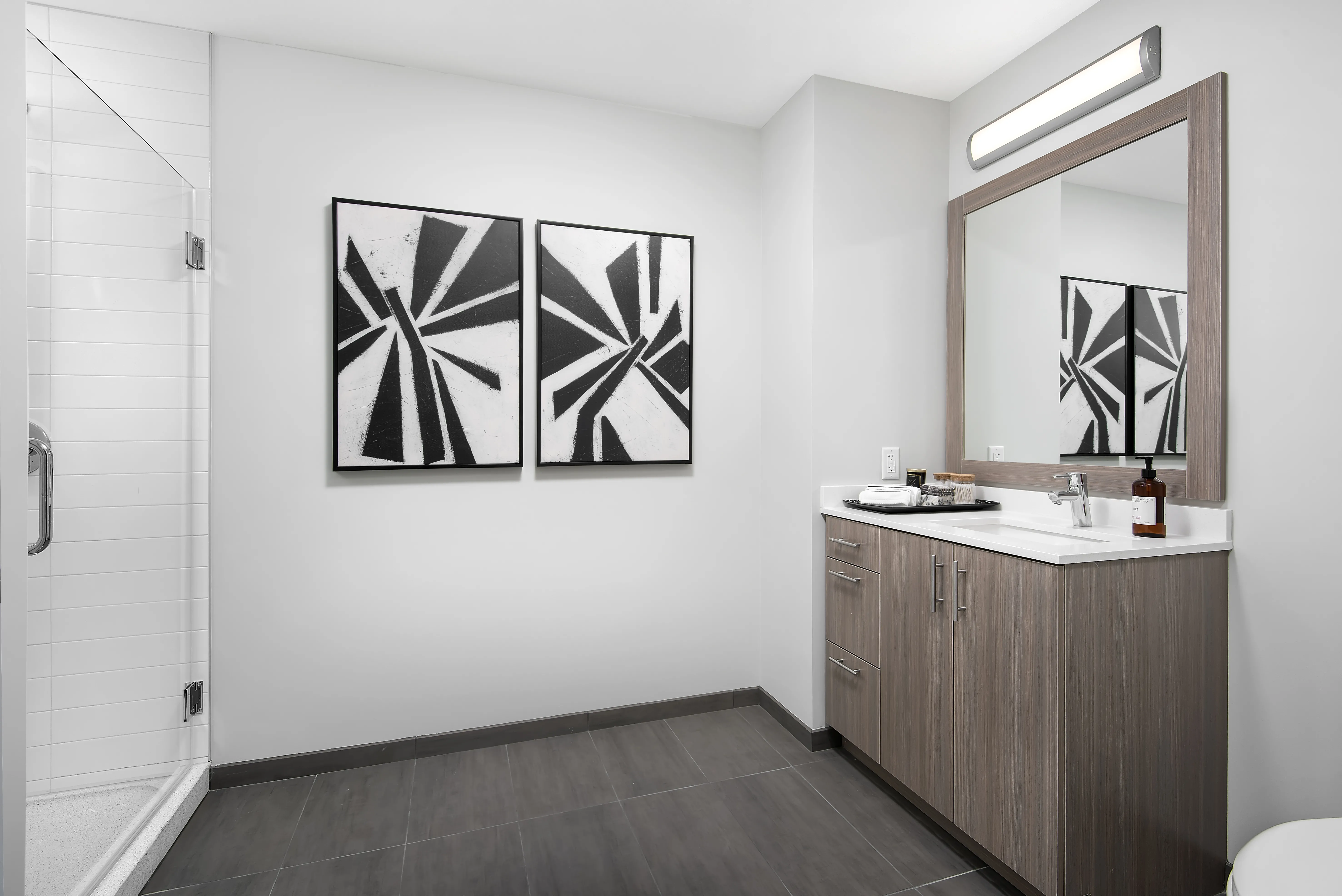 kitchen island, living area and view of the lake at Eleven40 Apartments