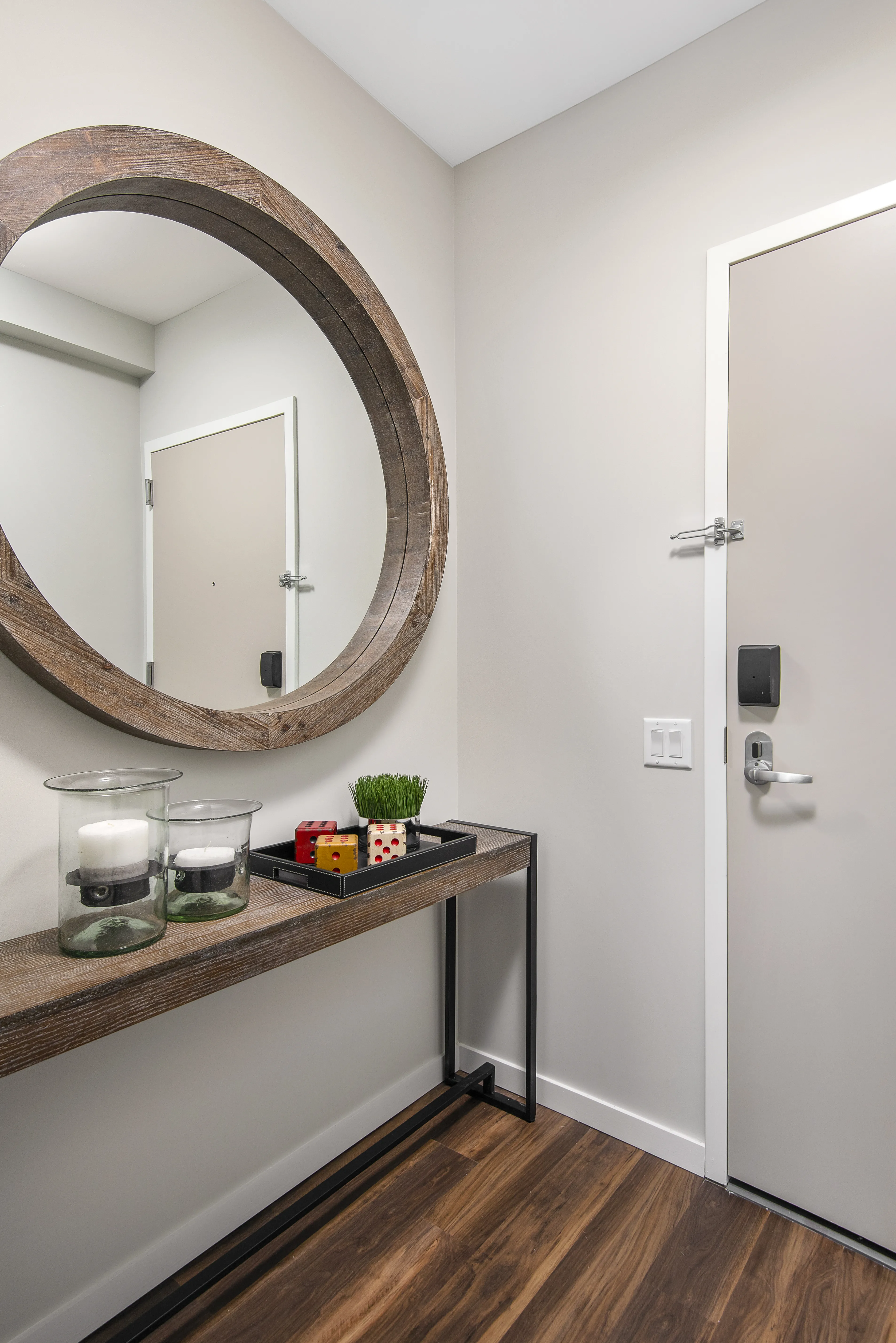 kitchen island, living area and view of the lake at Eleven40 Apartments