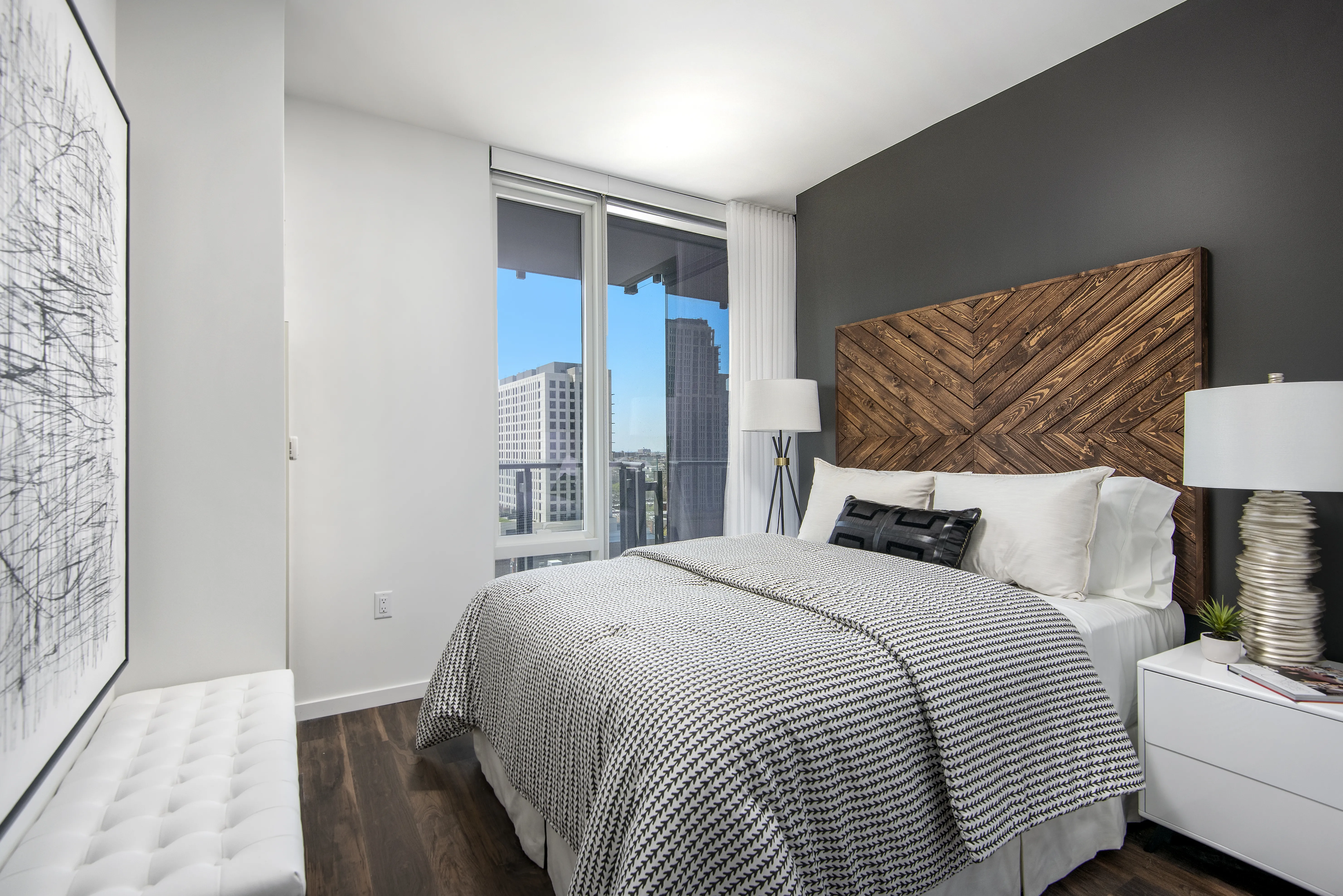 kitchen island, living area and view of the lake at Eleven40 Apartments