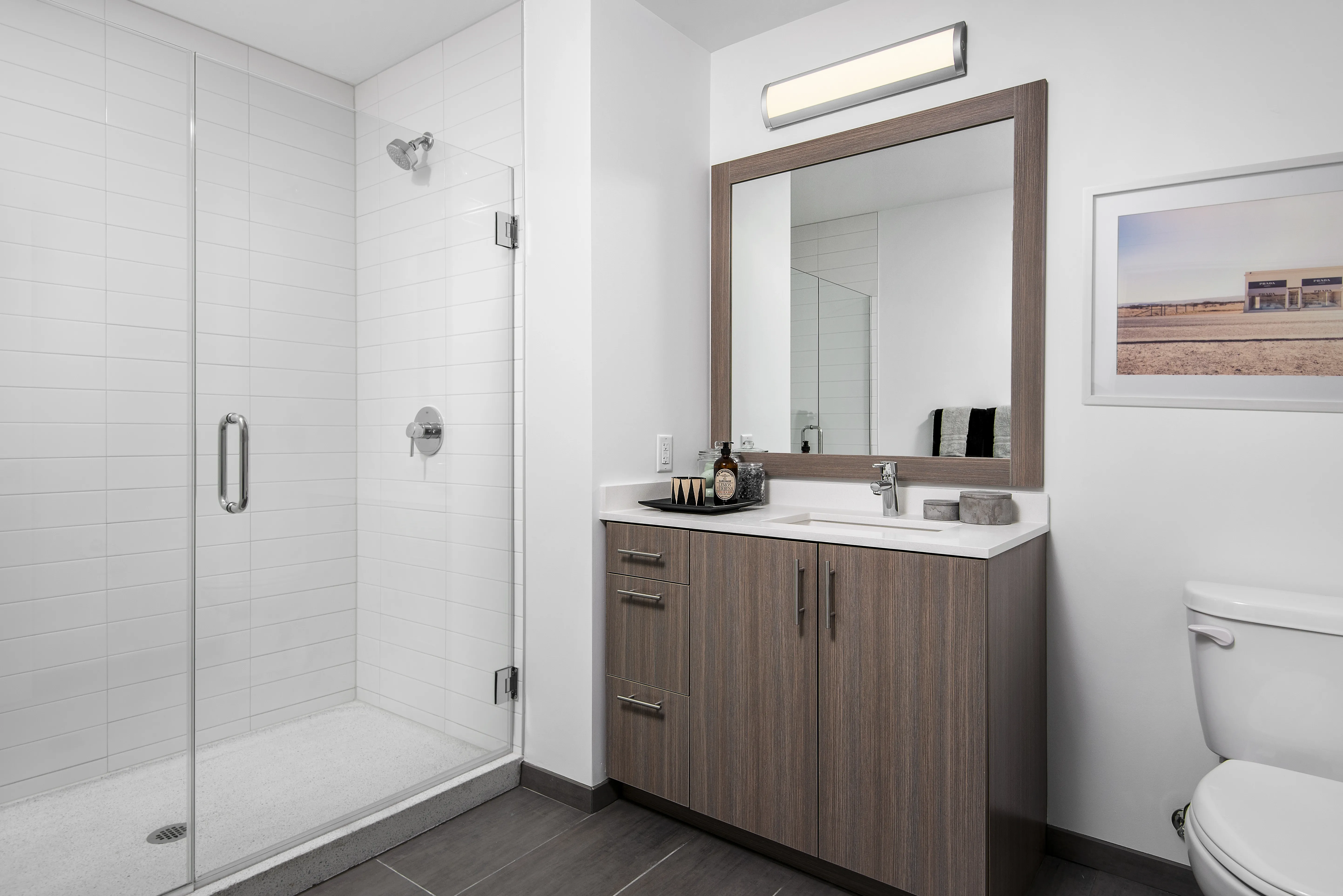 kitchen island, living area and view of the lake at Eleven40 Apartments