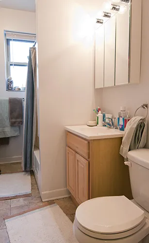 red brick exterior of the the streetside of 2247 Ridge Apartments