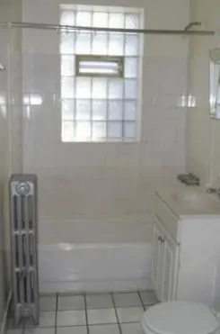 light brown brick exterior of 4756 North Maplewood Apartments 