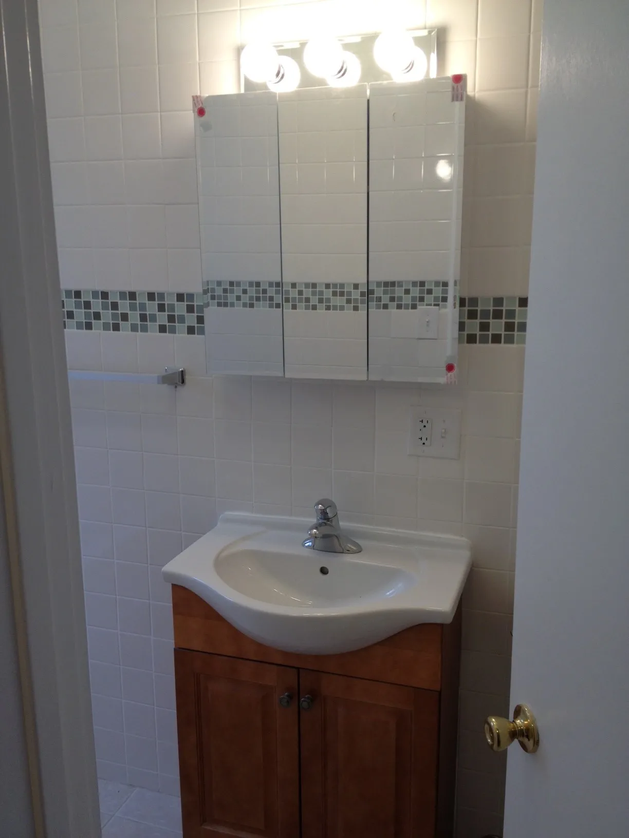 Bathroom sink plus medicine cabinet