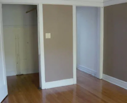 metal gate and landscaped courtyard at The Edward Apartments