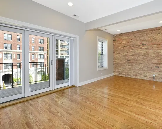 exterior of The Belmont by Reside Flats apartments in Lakeview