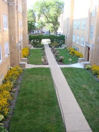 View from one of the apartments of the garden at the beginning of spring
