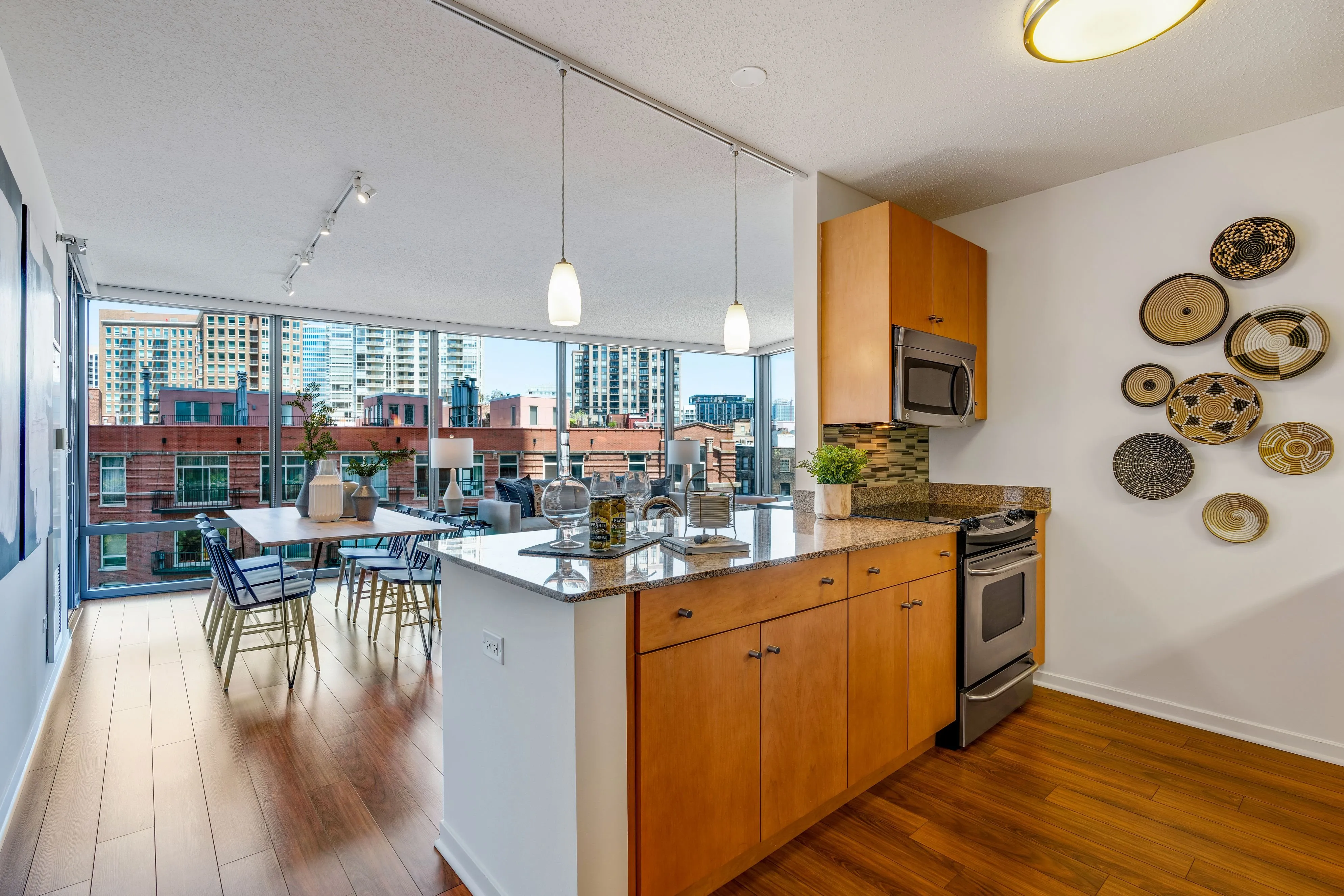 kitchen and living room at Kingsbury Plaza Apartments in River North Chicag