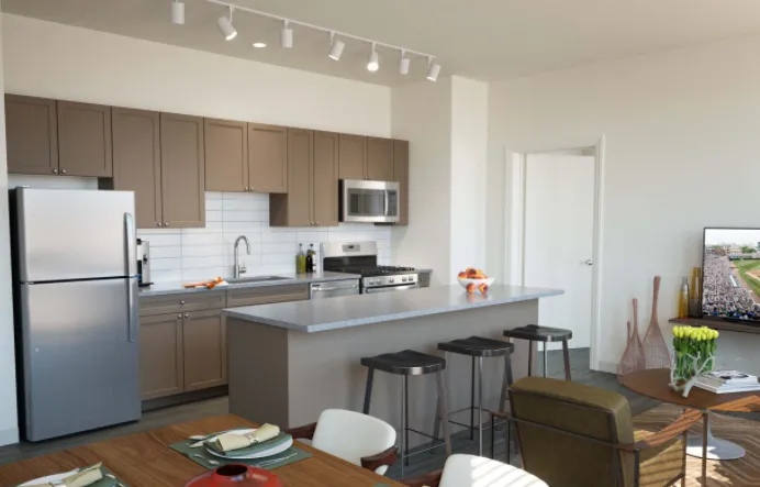 model kitchen with island at Linkt Apartments in River West