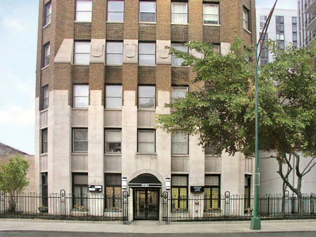 vintage exterior of Canterbury Court Apartments in the Gold Coast Chicago